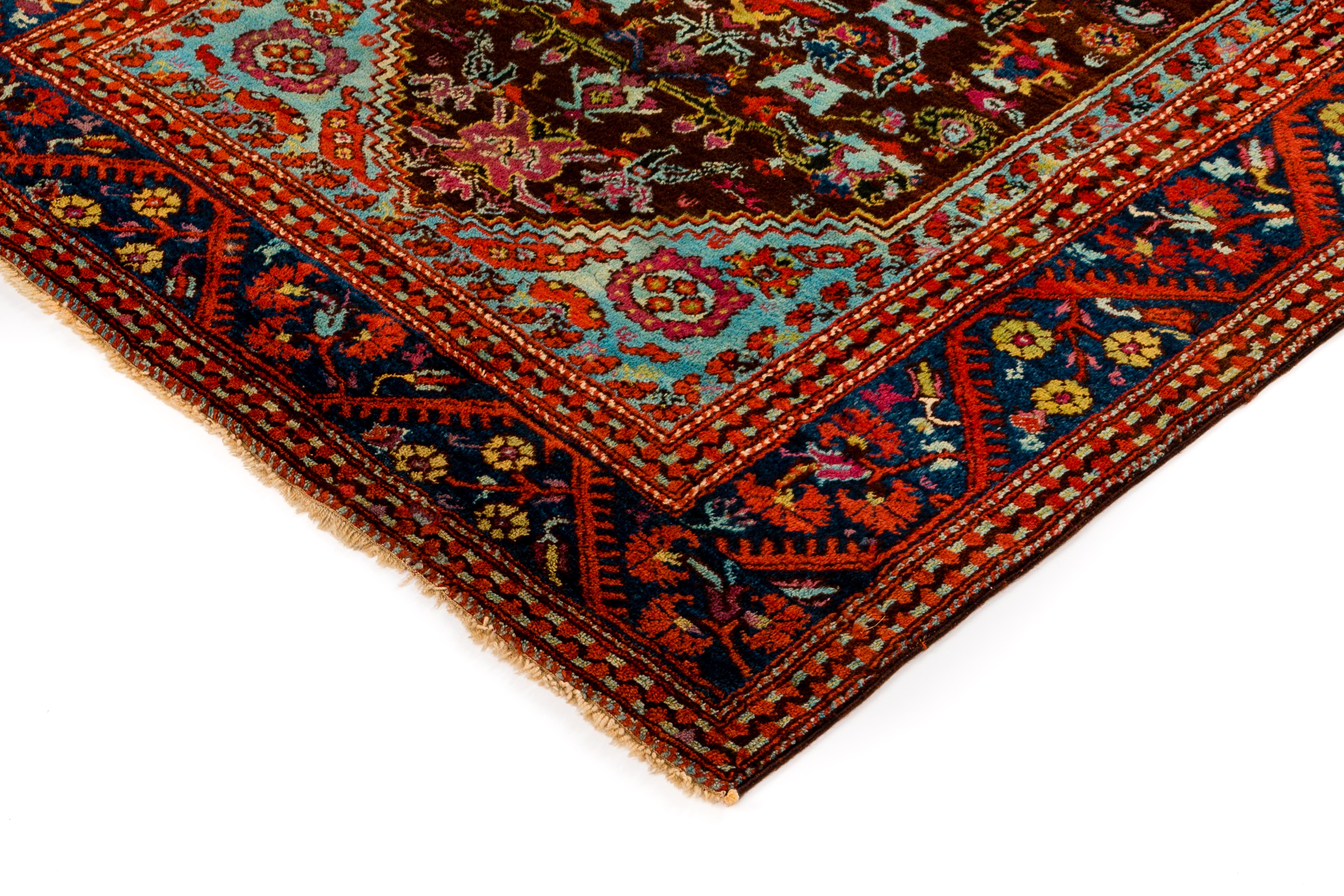 This newly woven, room-size rug is inspired by antique Persian carpets from the 19th century. Handmade in Afghanistan.
