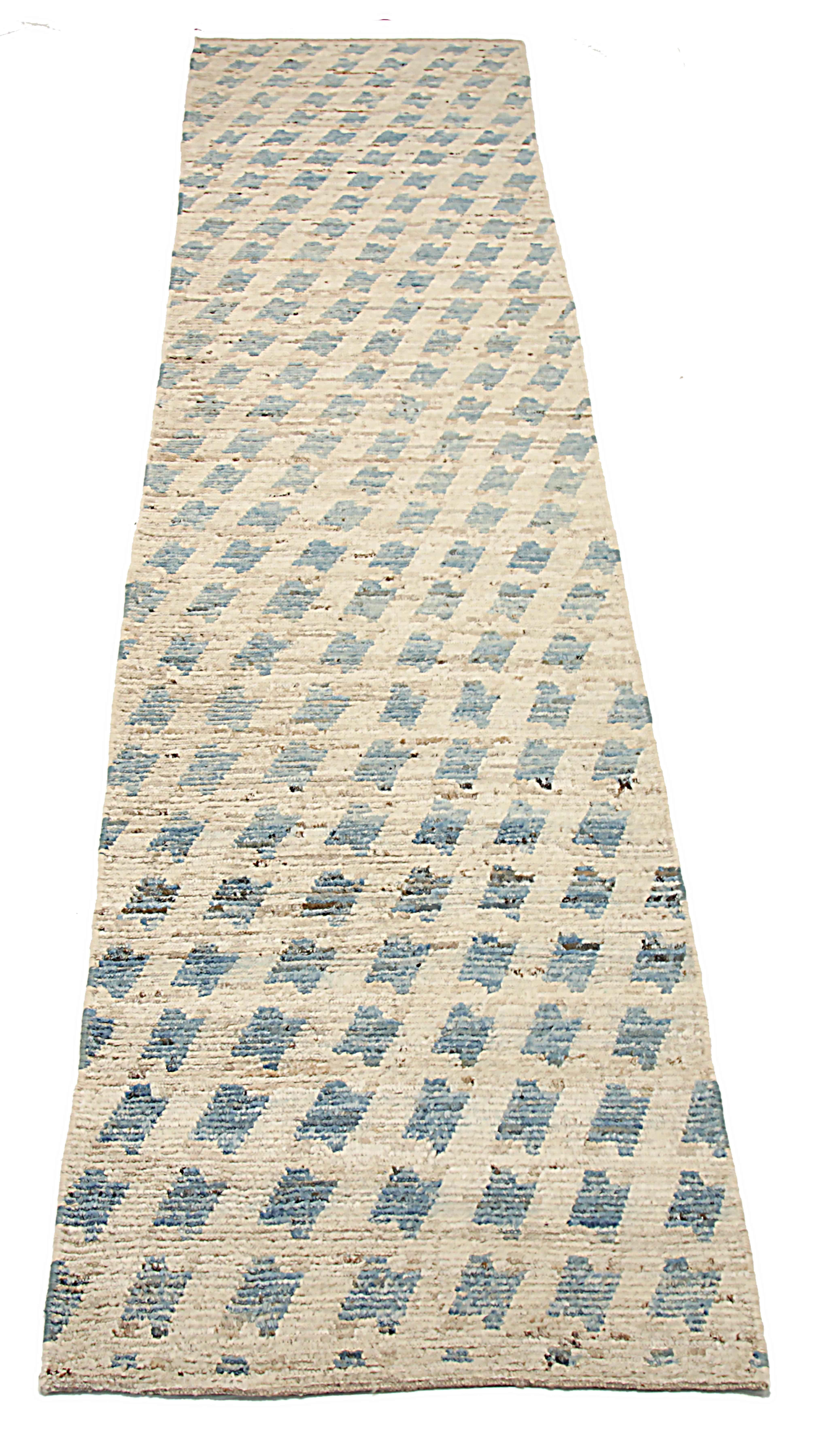 New Afghan runner rug handwoven from the finest sheep’s wool. It’s colored with all-natural vegetable dyes that are safe for humans and pets. It’s a traditional Moroccan design handwoven by expert artisans. It’s a lovely runner rug that can be
