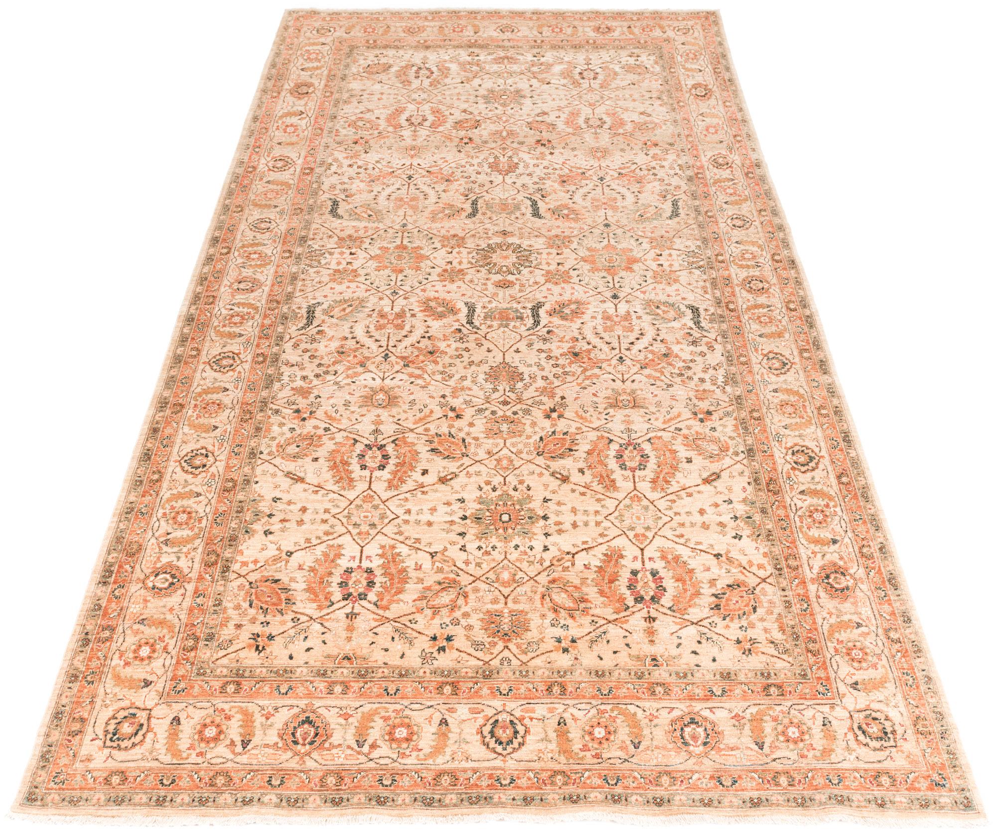 This transitional handwoven rug is an updated version of traditional oriental rugs with more subtle colors and a neutral field. The blend of traditional and contemporary elements offers versatility for any home.