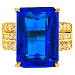 New African 12.5 Ct Swiss Blue Topaz 
White Sapphire Y Gold Platedsterling Ring