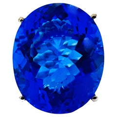 New African 23.90 Ct Neon Blue Topaz 
White Sapphire Sterling Ring
