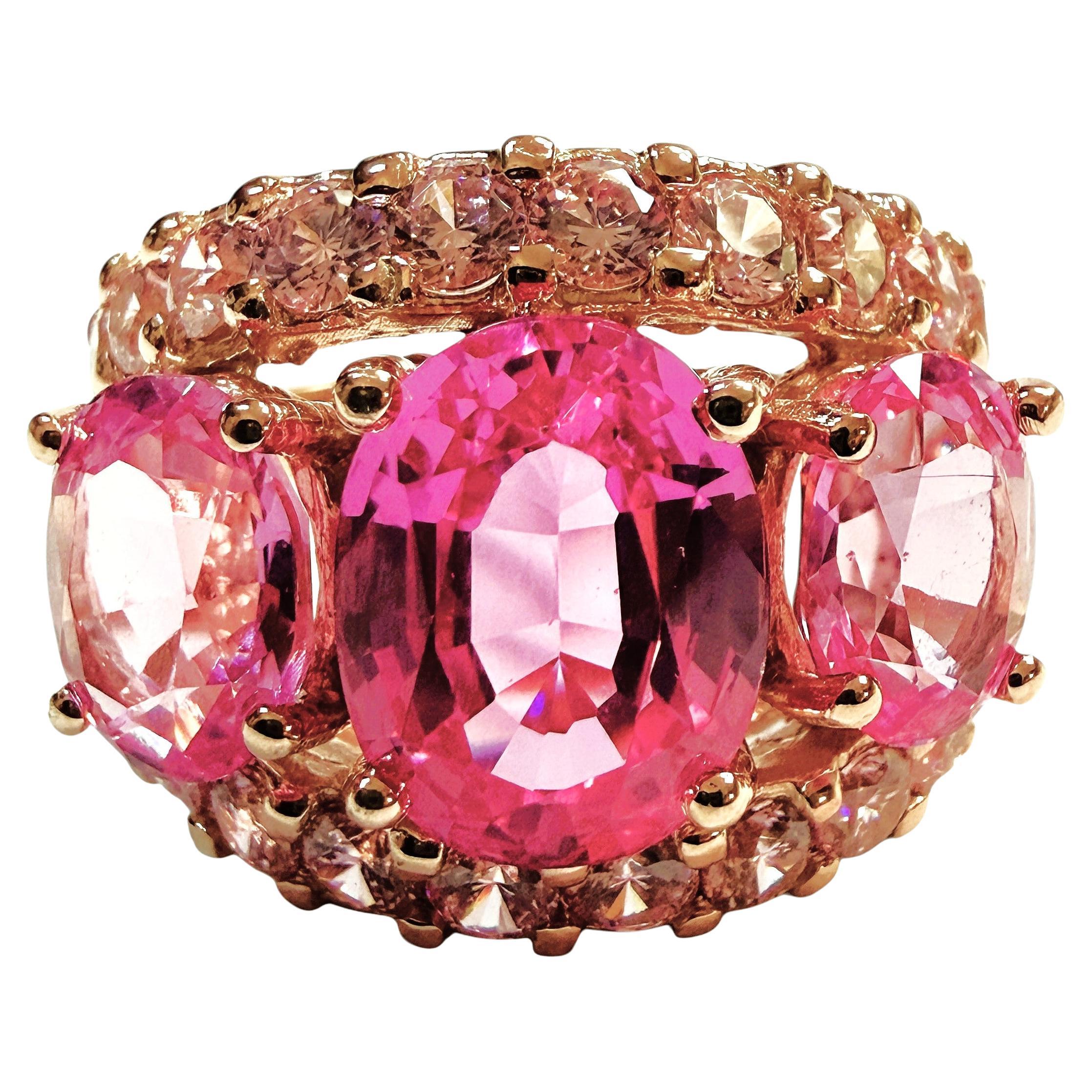 New African 3-Stone 7.75 Ct Pink Sapphire Rose Plated Sterling Ring en vente