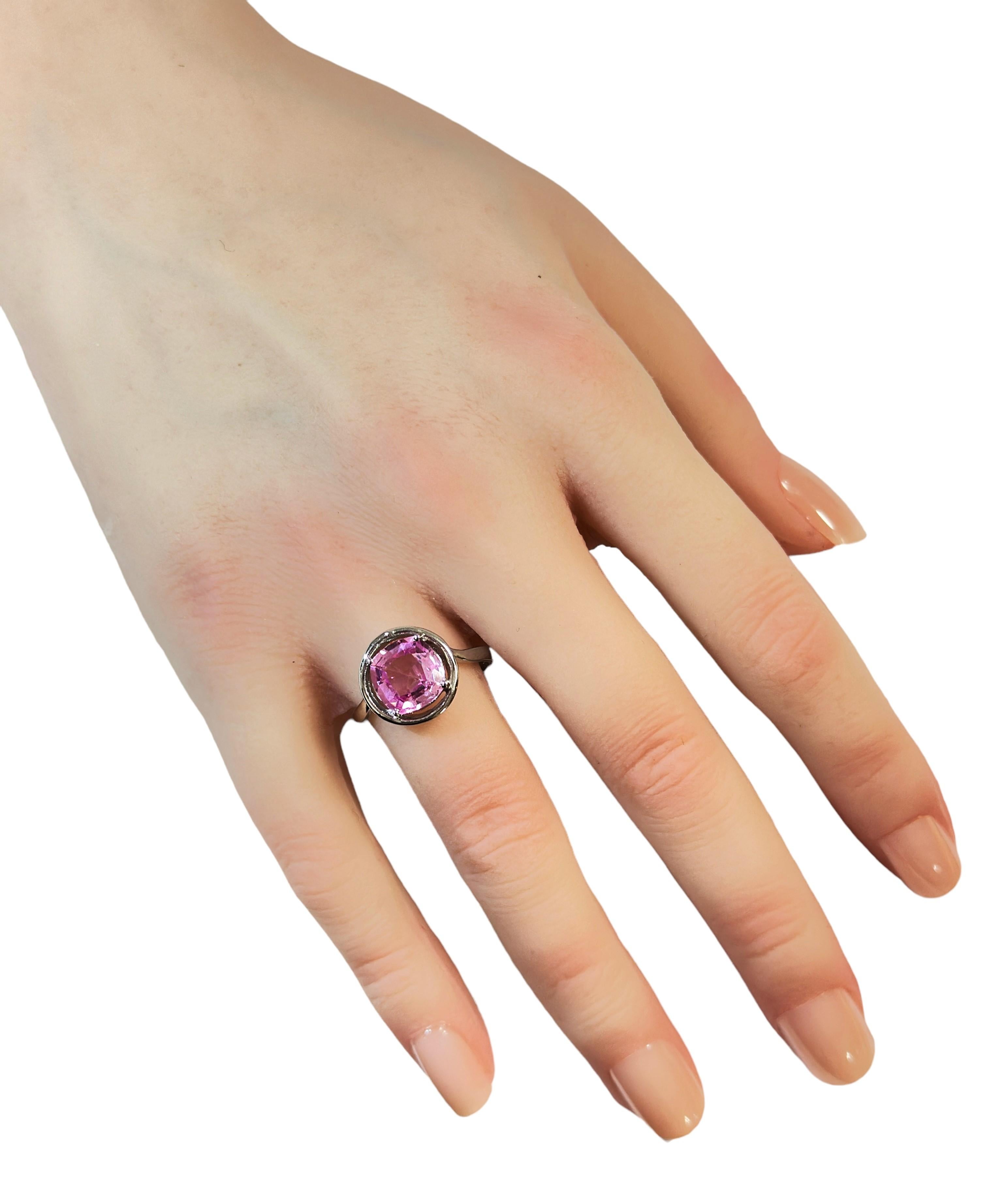 Such a beautiful color this ring has.  The ring is a size 7.75.  The stone is from Africa and is just exquisite.  It is a cushion cut stone and is 3.3.0 Ct   The main stone measures 8.8 mm. It is a simple and elegant design.  A ring that you can