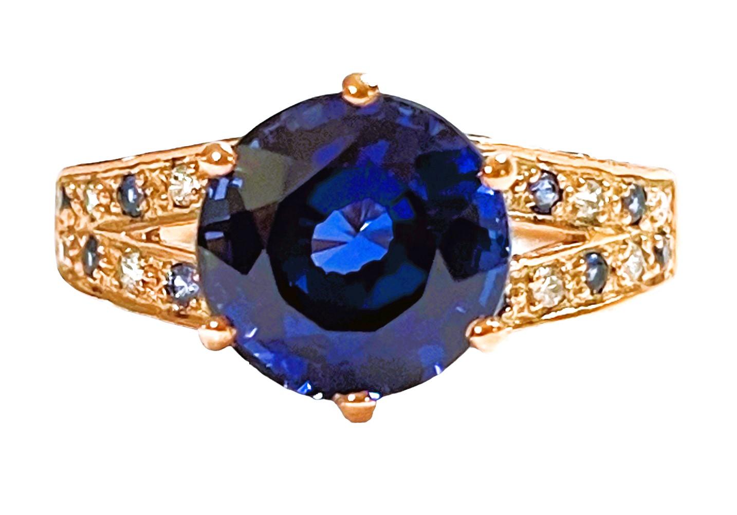 The ring is a size 6.5 and has just a beautiful setting..  It was mined in Africa.  It is an authentic natural stone. It is a very high quality stone.  The stone is an round cut stone and is 3.70 cts.  It has diamond cut Blue and White Sapphires