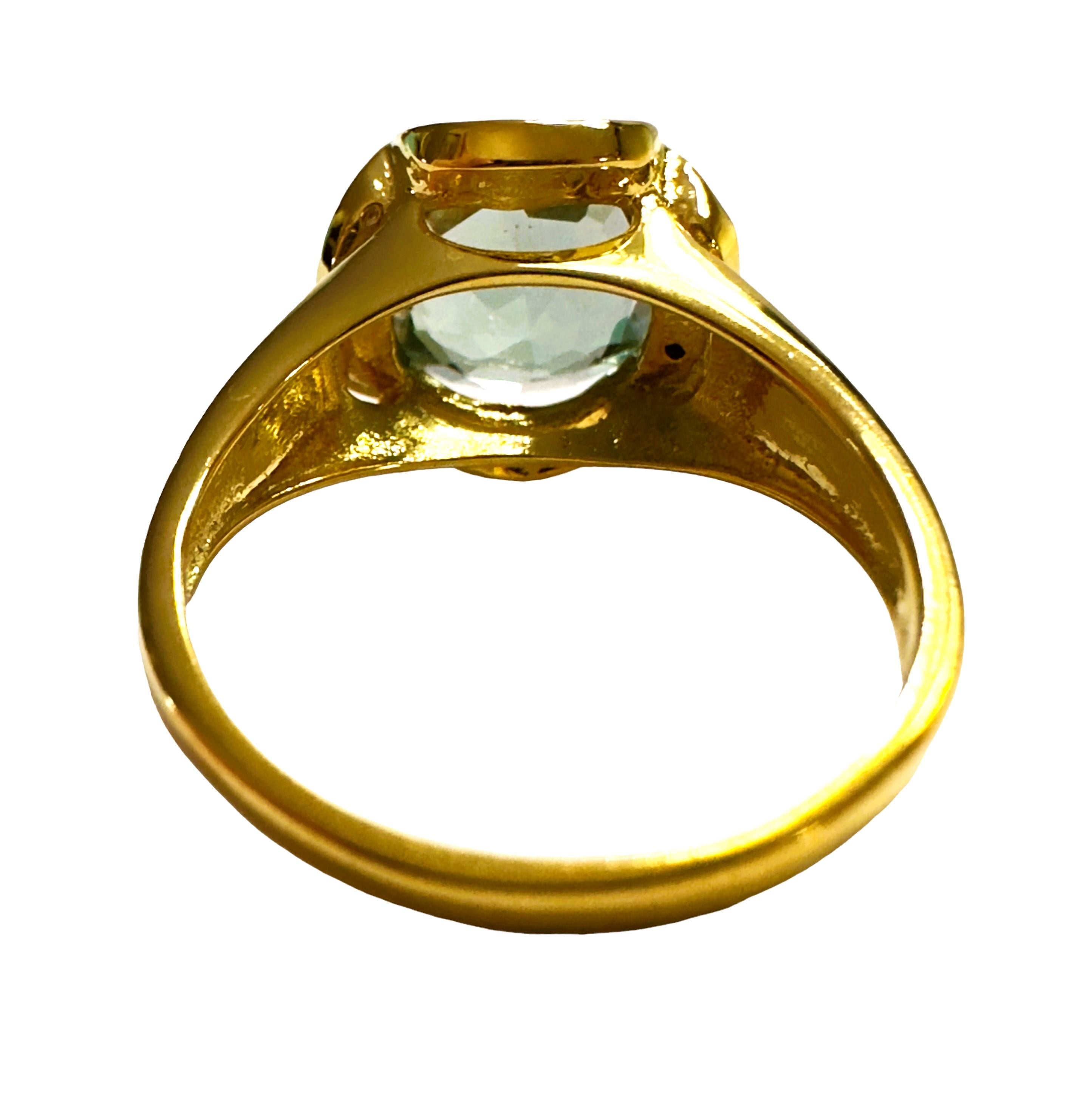 What a beautiful ring this is!.  It is a size 7.25.  It was mined in Africa.  It is a very high quality stone.  The stone is a round cut stone and is 4.10 cts.  It's just a great simple and elegant design.  The main stone measures 10.2 mm and is
