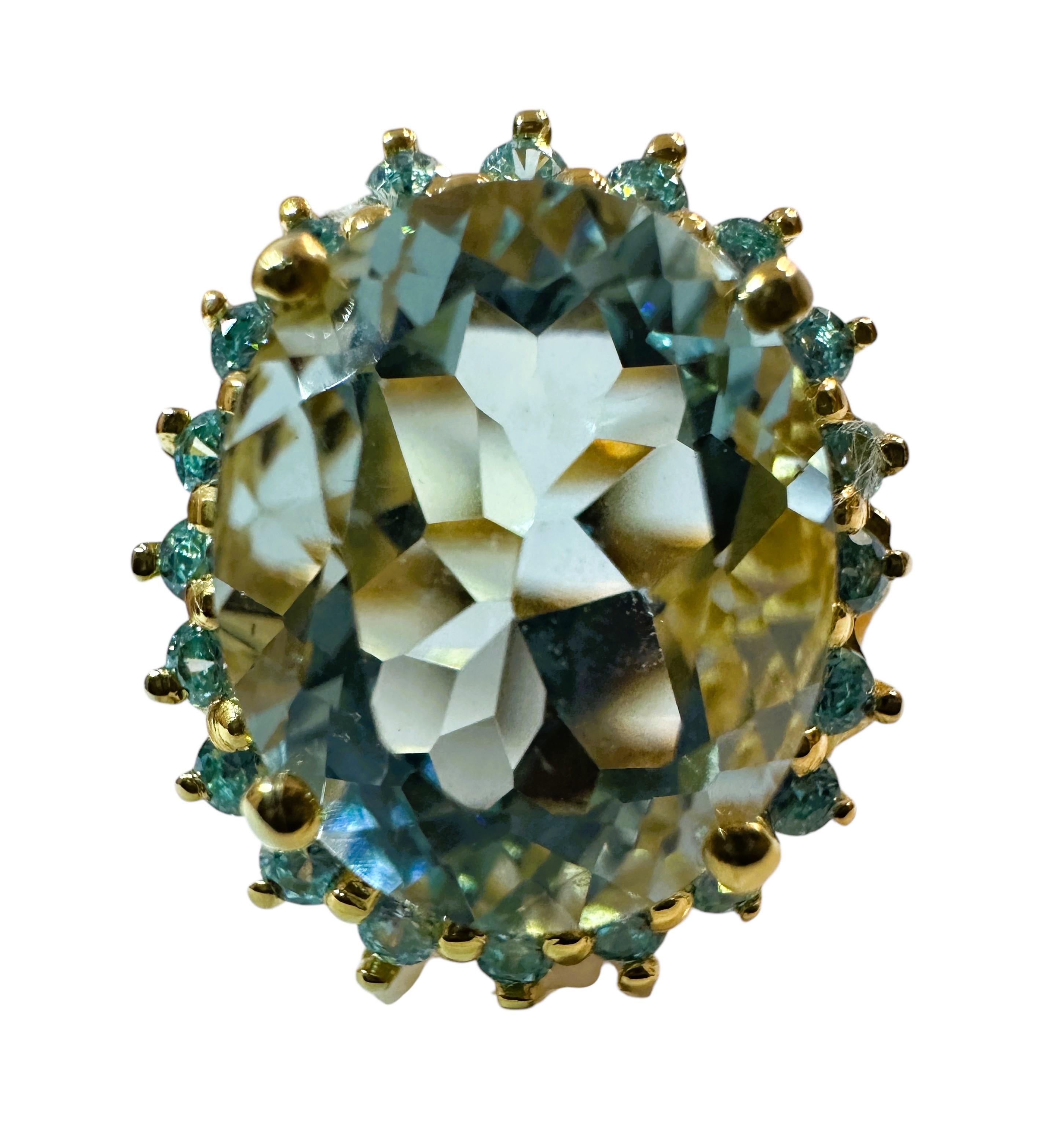The ring is just stunning!  It is a size 7. This stone is from Africa.  It is a beautiful fancy cut oval stone and is 4.14 cts.  It's a very high quality stone.  It measures 12.2 x 10 mm.   It is a beautiful ring and has a small diamond cut aqua