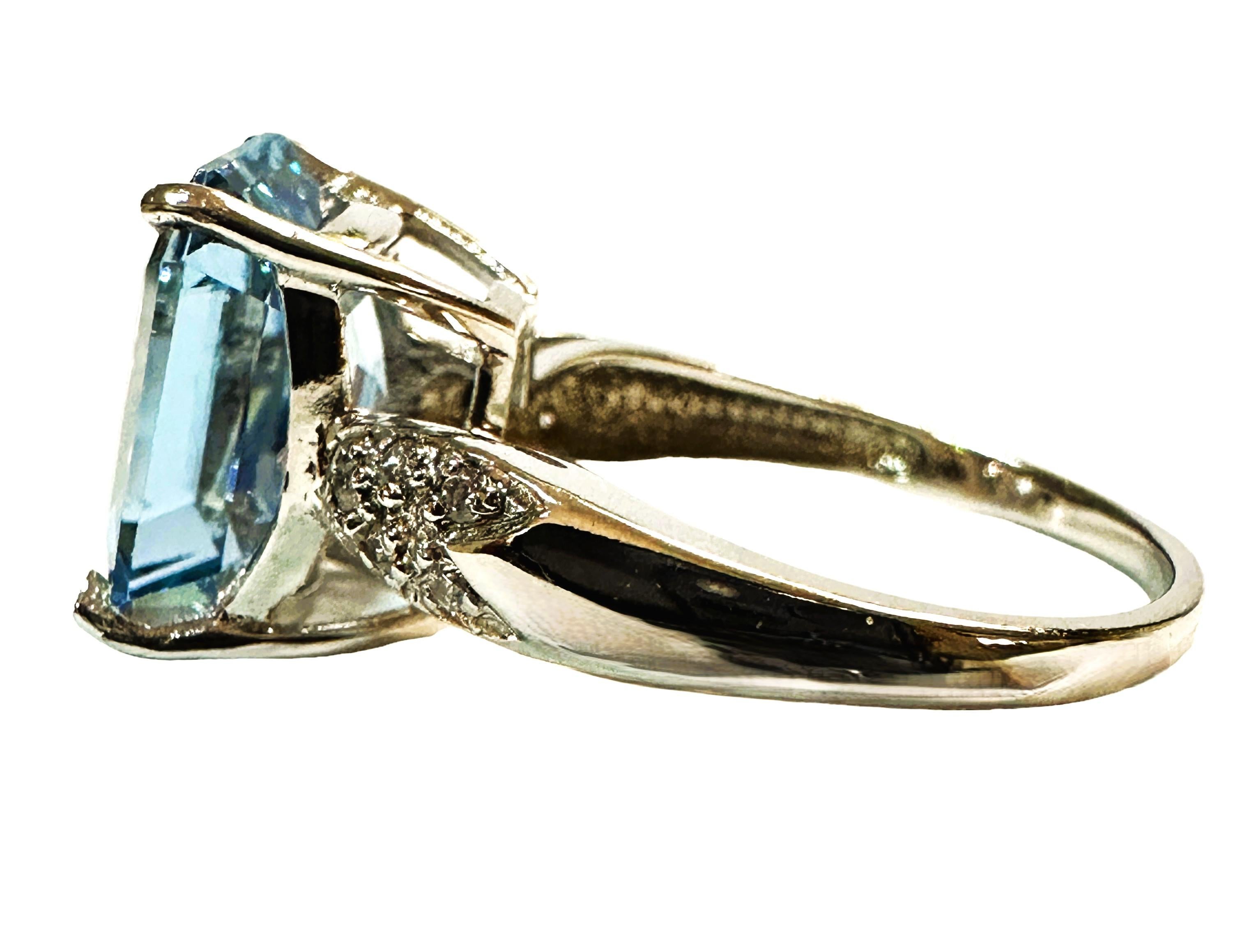 I love the color of this stone.  It is a soft blue much like a cornflower blue. The ring is a size 7.  The stone is from Africa and is just exquisite.   It is a fancy cut baguette stone and is 6.7 Ct   The main stone is 12 x 10 mm and has diamond
