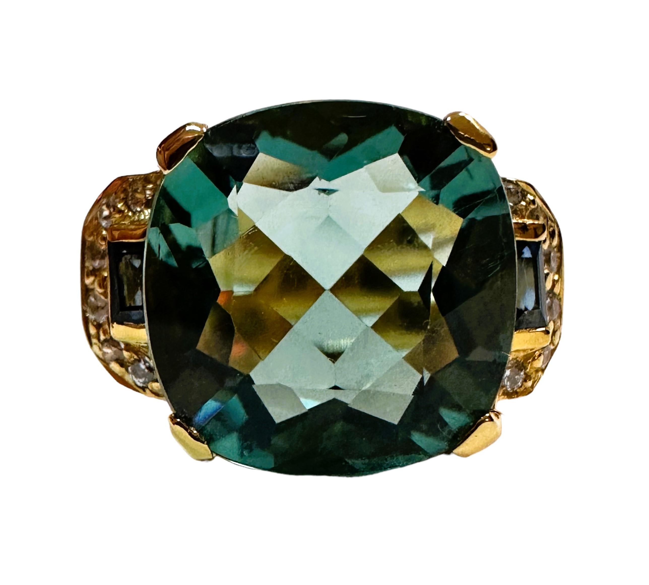 What a beautiful ring this is!.  I just love the design.  It is a size 6.25.  It is from Africa and is a very high quality stone.  The stone is a fancy cut cushion stone and is 7.3 cts.   The main stone measures 12.3 x 12.3 mm and is set in a