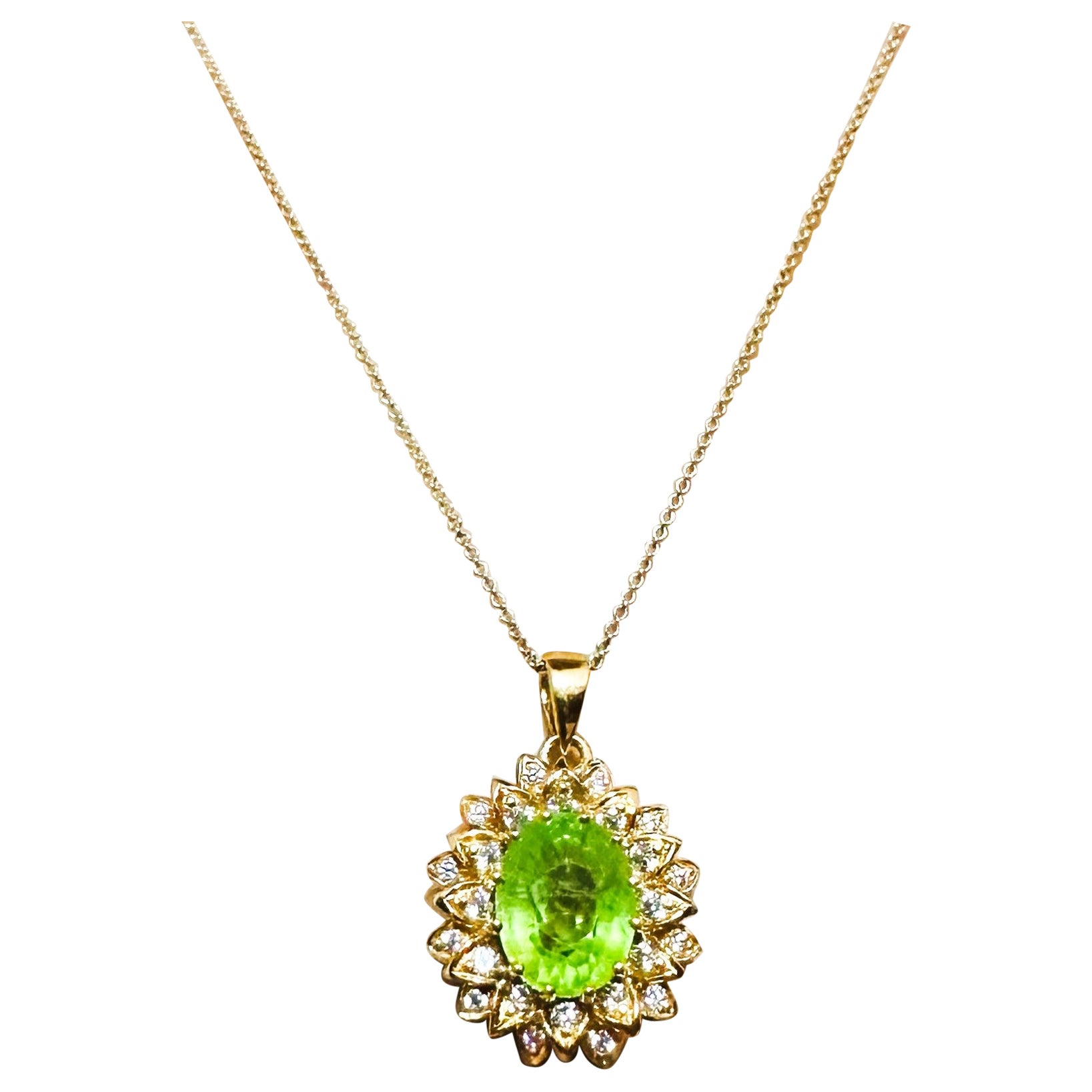 This pendant is just beautiful!  The stone is from Africa and is just exquisite. It is a very high quality stone. The main stone is 7.3 cts.  It's an oval cut stone and  measures 12 x 9 mm. It is surrounded by 2 rows of diamond cut white sapphires. 