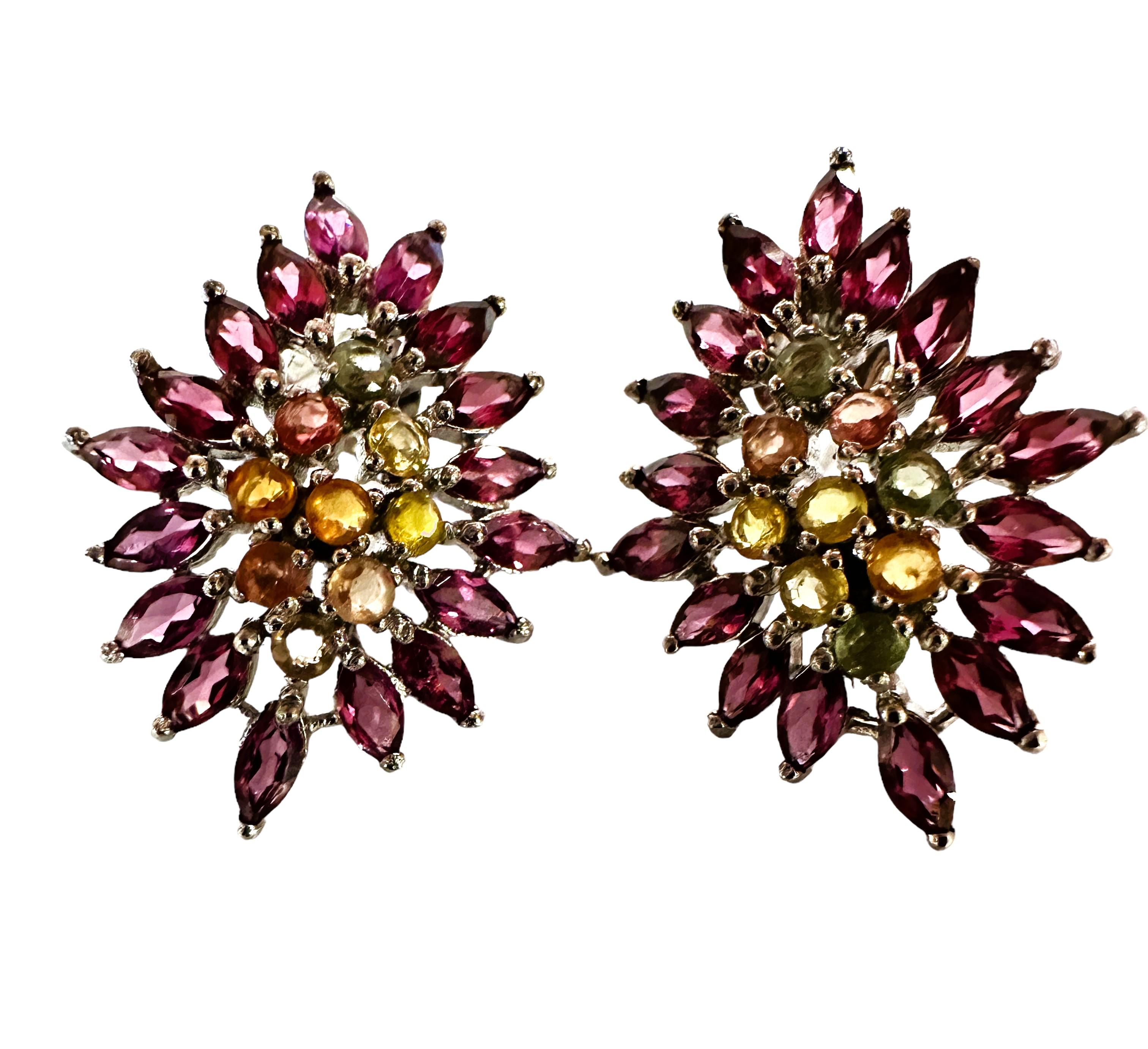What beautiful colors in these earrings!   They are highly rated stones. They total 3.81 carats each They are post earrings with a large butterfly back so they will stay secure.  The butterfly back is stamped 