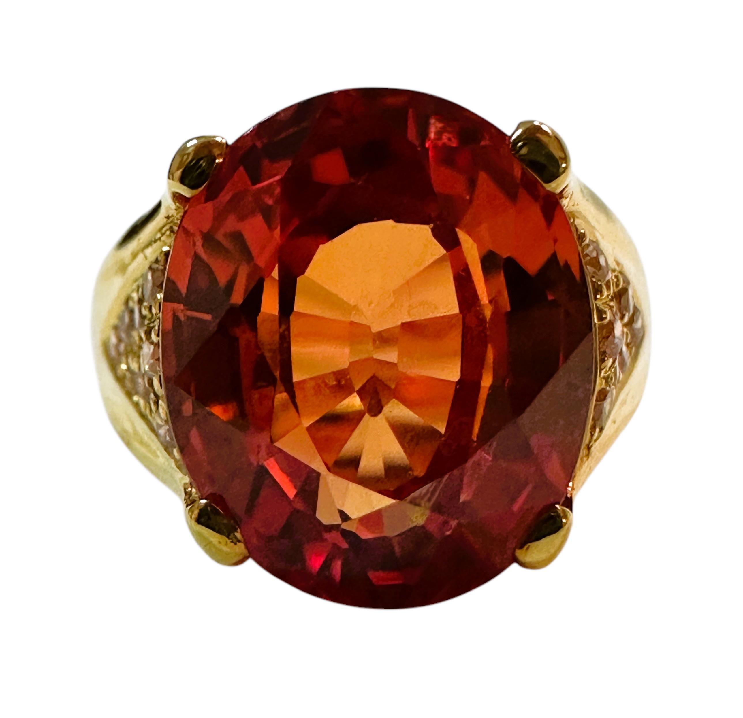 What beautiful stone in this ring!  The ring is a size 6.25.  The stone is from Africa and is just exquisite.  It is a highly rated stone.  It is an oval cut stone and is 8.8 Cts   The main stone is 13.3 mm x 11 mm and has beautiful diamond cut