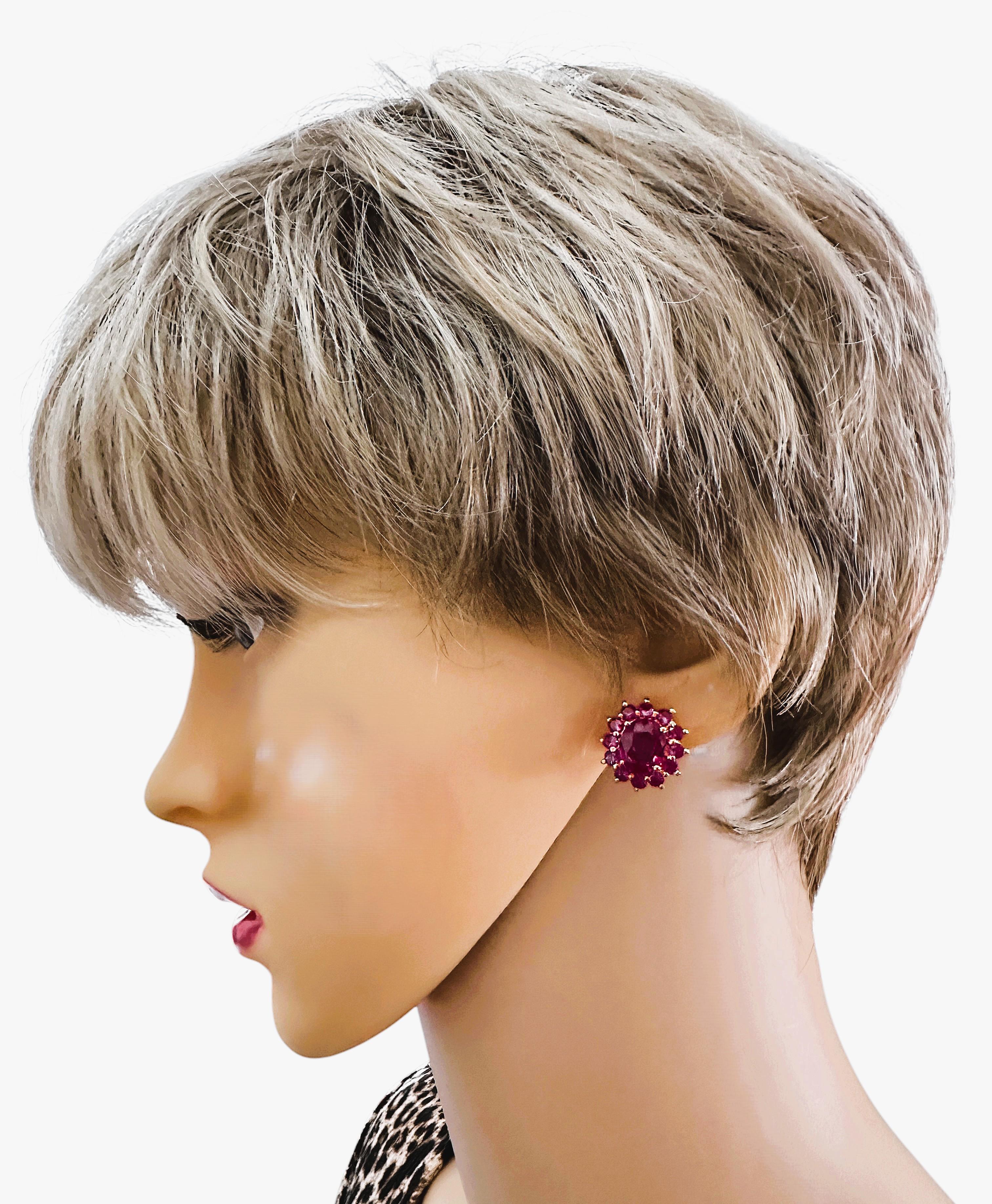 I love the color of these stones.  They are just so brilliant.  The stones are from Africa and are just exquisite.  They are oval cut stones and are each 4.90 Cts.   They measure 10 mm long and 8 mm wide and are surrounded by diamond cut red