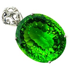 New African Concave 34.40 Ct Peridot & White Sapphire Sterling Pendant