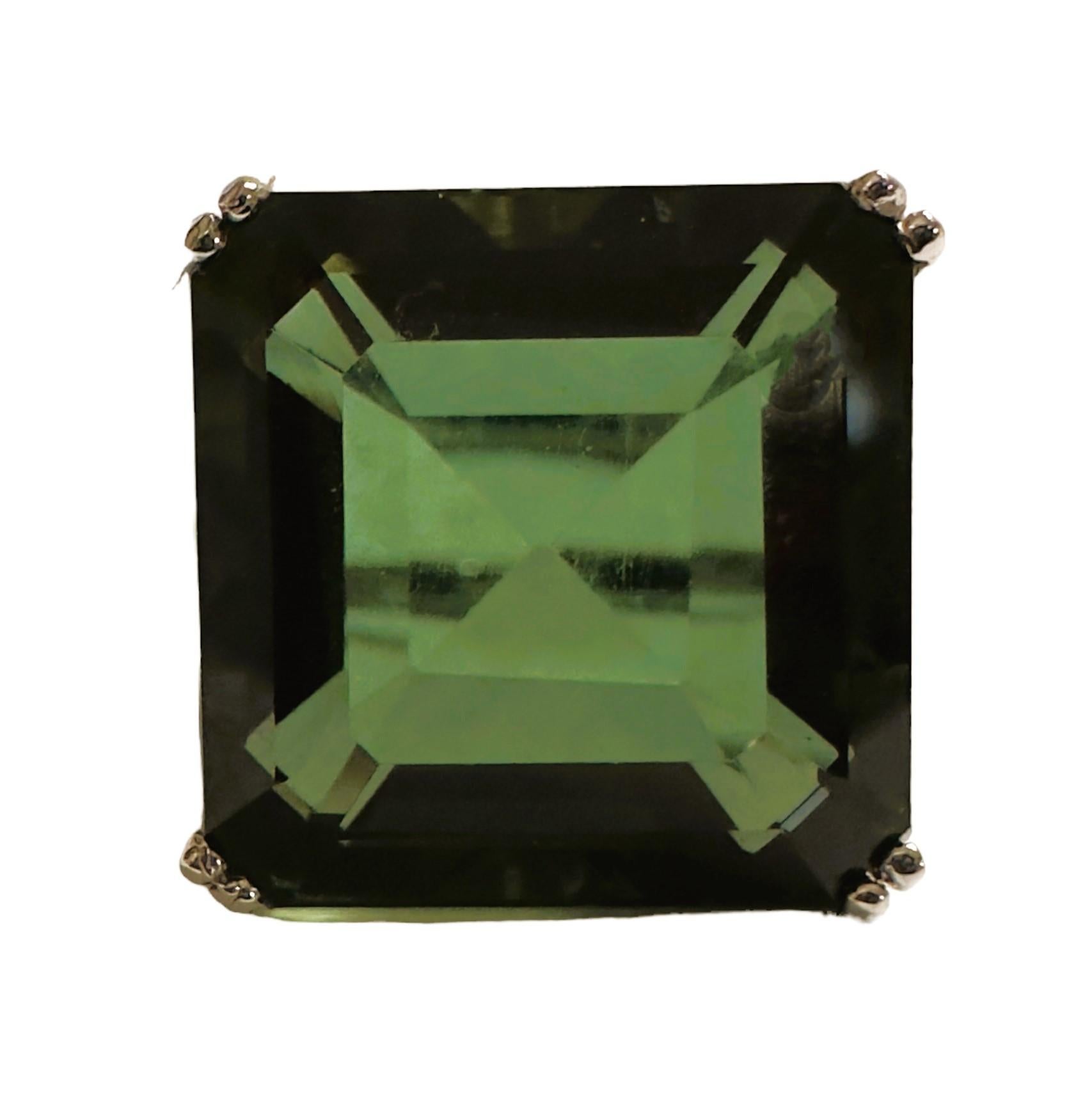 What a beautiful color this Stone is!  The ring is a size 6.75.  This stone is from Africa. It is a beautiful princess cut stone and is 14.80 cts.  It's a very high quality stone.  The 