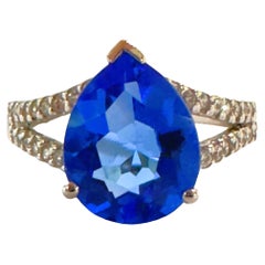 New African IF 3 Ct Intense Blue Topaz & White Sapphire Sterling Ring