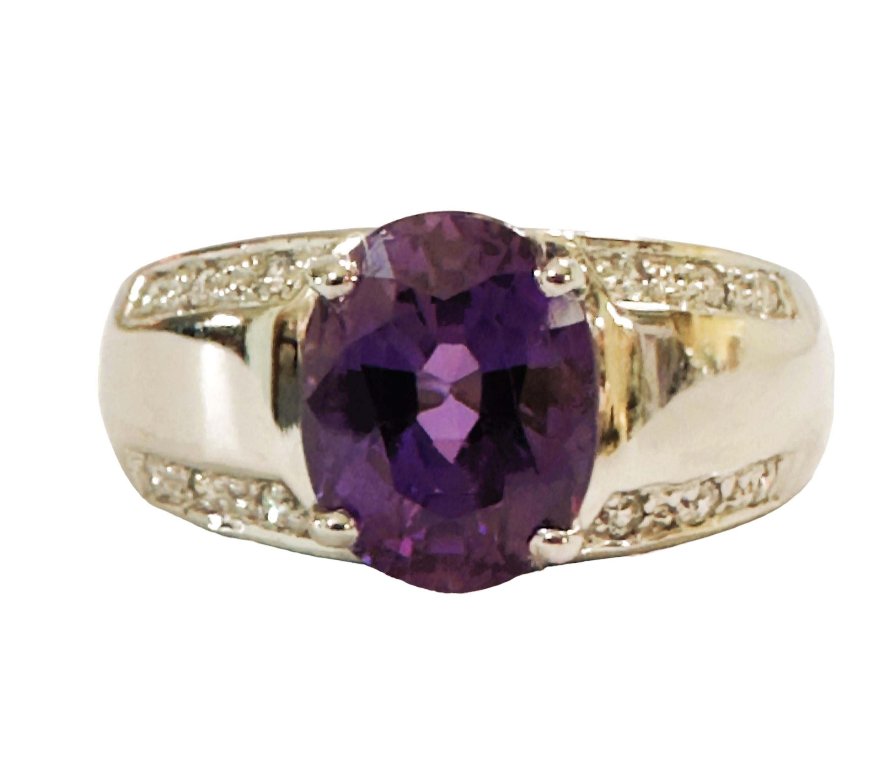 This stone has such gorgeous color!  The ring is a size 9.25.  The stone is from Africa.   It is a highly rated IF (Internally Flawless) stone.  The stone is an oval cut stone and is 3.20 cts.  It measures 9.2 x 7 mm.  It is has two rows of diamond