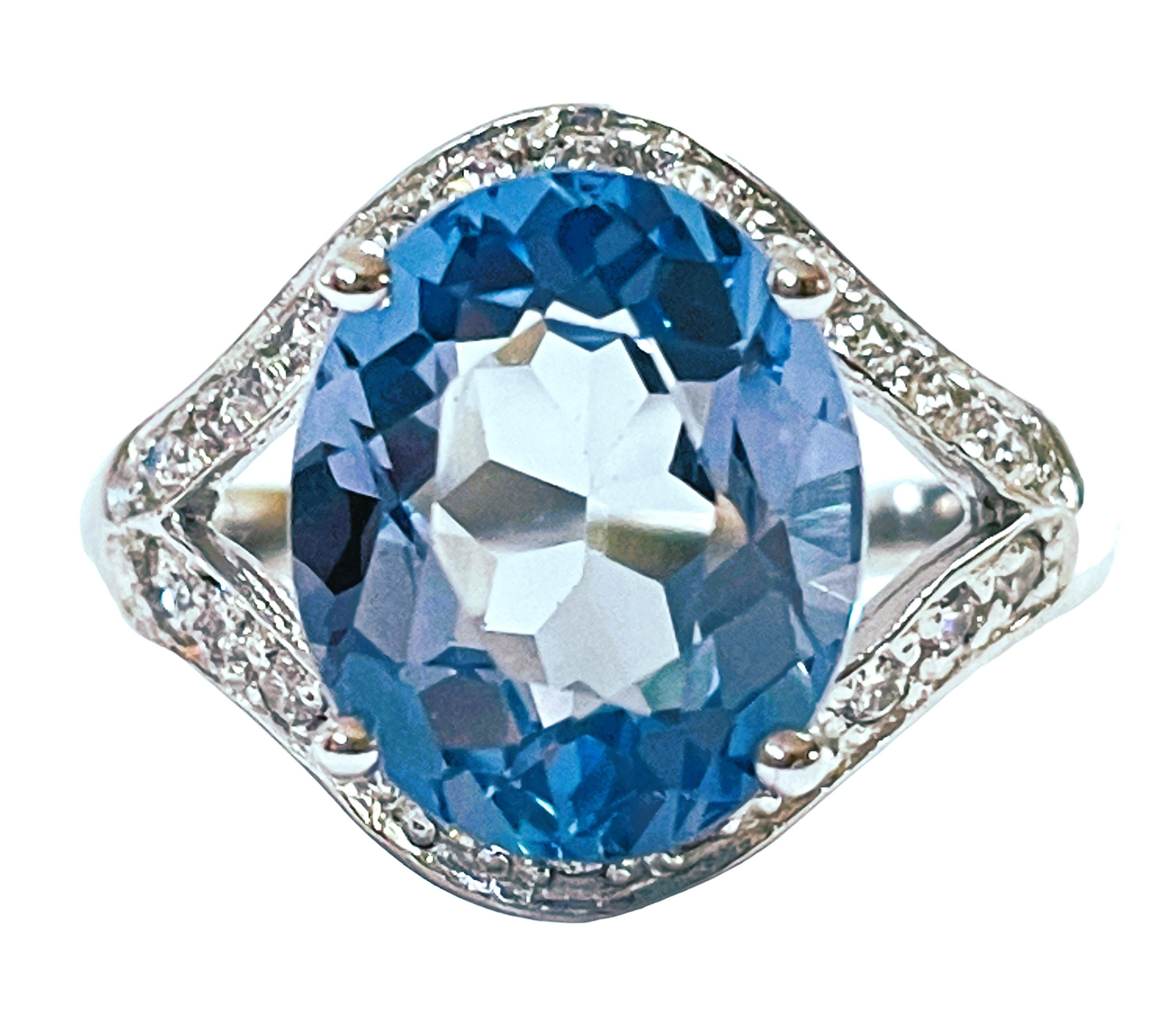 What a gorgeous ring!  The ring is a size 9.   It was mined in Africa and is just an exquisite color-changing Spinel.  A very high quality stone and free of any inclusions.   It is a oval cut stone and is 6.5  Cts.   The main stone is 12.2 x 10.2