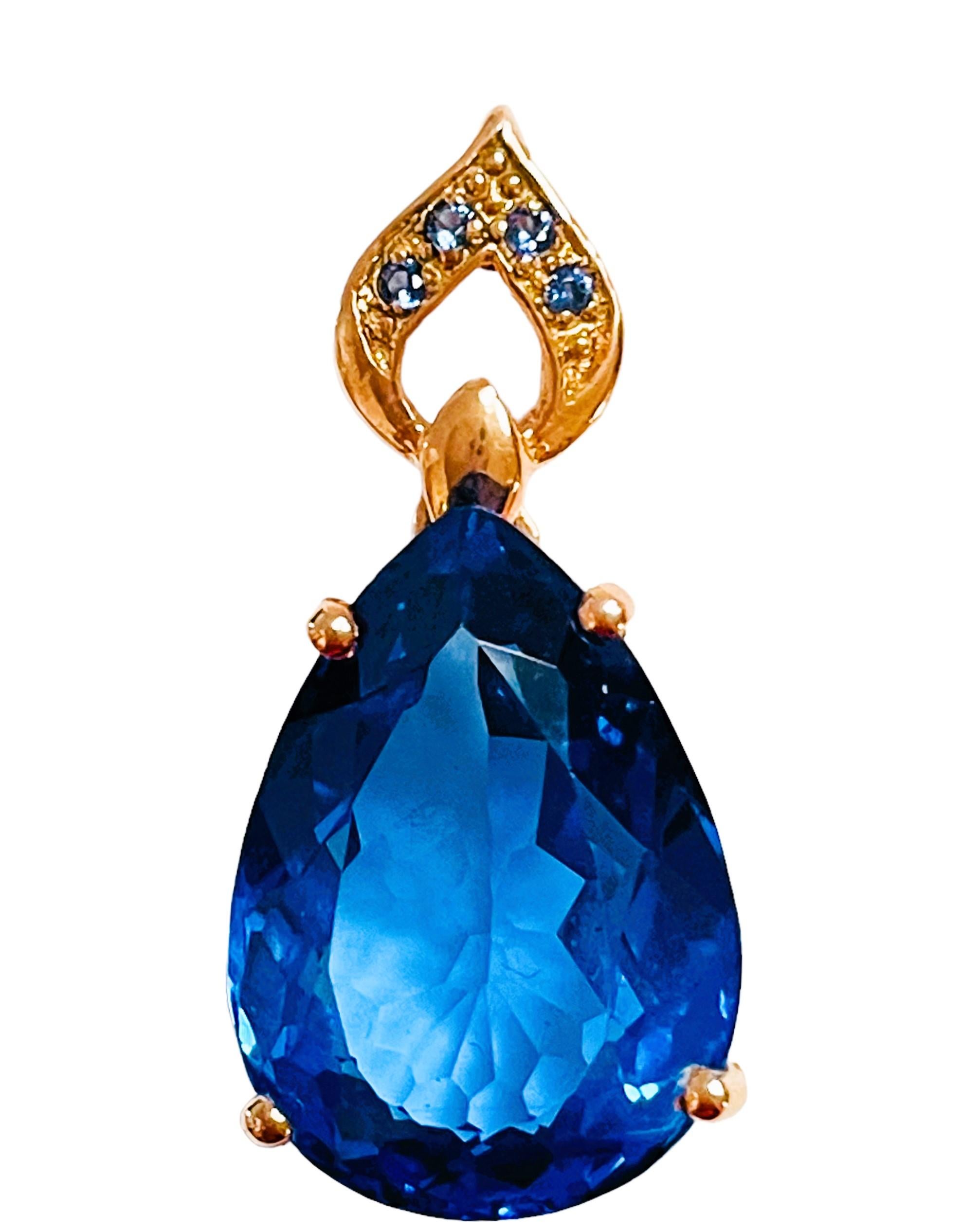 The stone was mined in Africa and is just exquisite. It is a highly rated IF (Internally Flawless) stone.  A gorgeous, very high quality stone. It is an pear cut stone and is 11.50 Cts.  It measures 17 x 12.3 mm. It has Blue Sapphires on the bezel. 