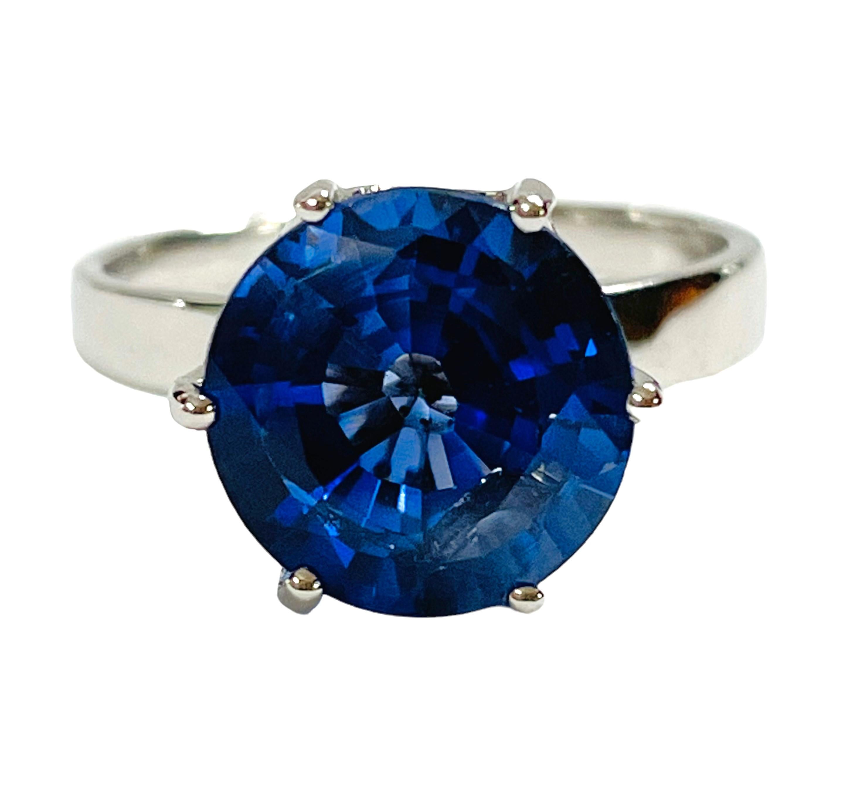 The sapphire was mined in Africa and is just exquisite. It is a beautiful round cut and is 4.40 Ct   The main stone is 9 x 9 mm.  Very beautiful  indeed.  Sure to get noticed.  The weight in Grams is 3.48.  I have many items on auction that have