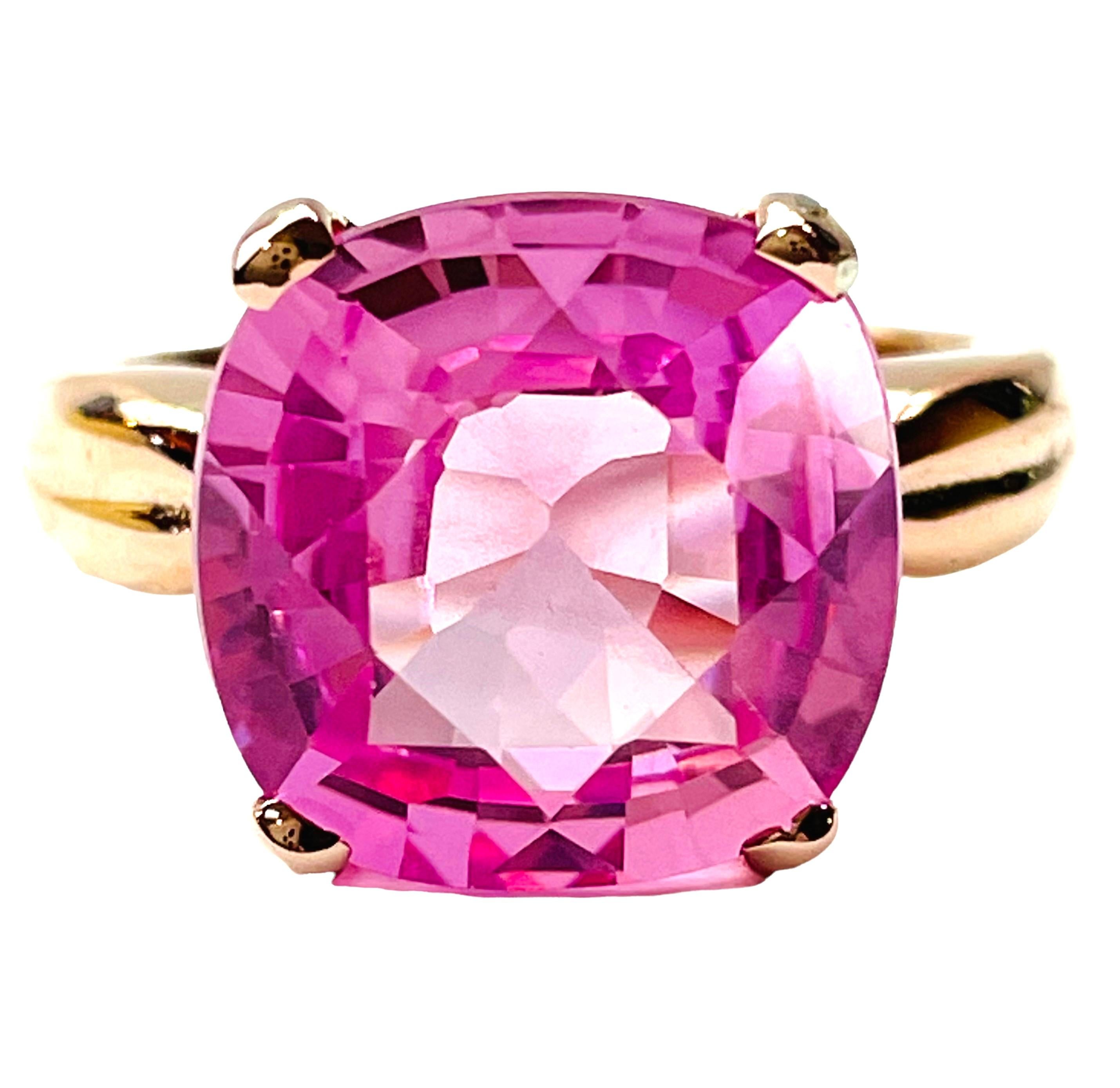 It's a beautiful statement ring and the stone is just stunning.. What a gorgeous pink color.  It's just beautifully cut.  It is 8.60 carats and measures 12.2 x 12.2 mm. An absolute quality piece of work.  Just a beauty!  Sure to be noticed.  The