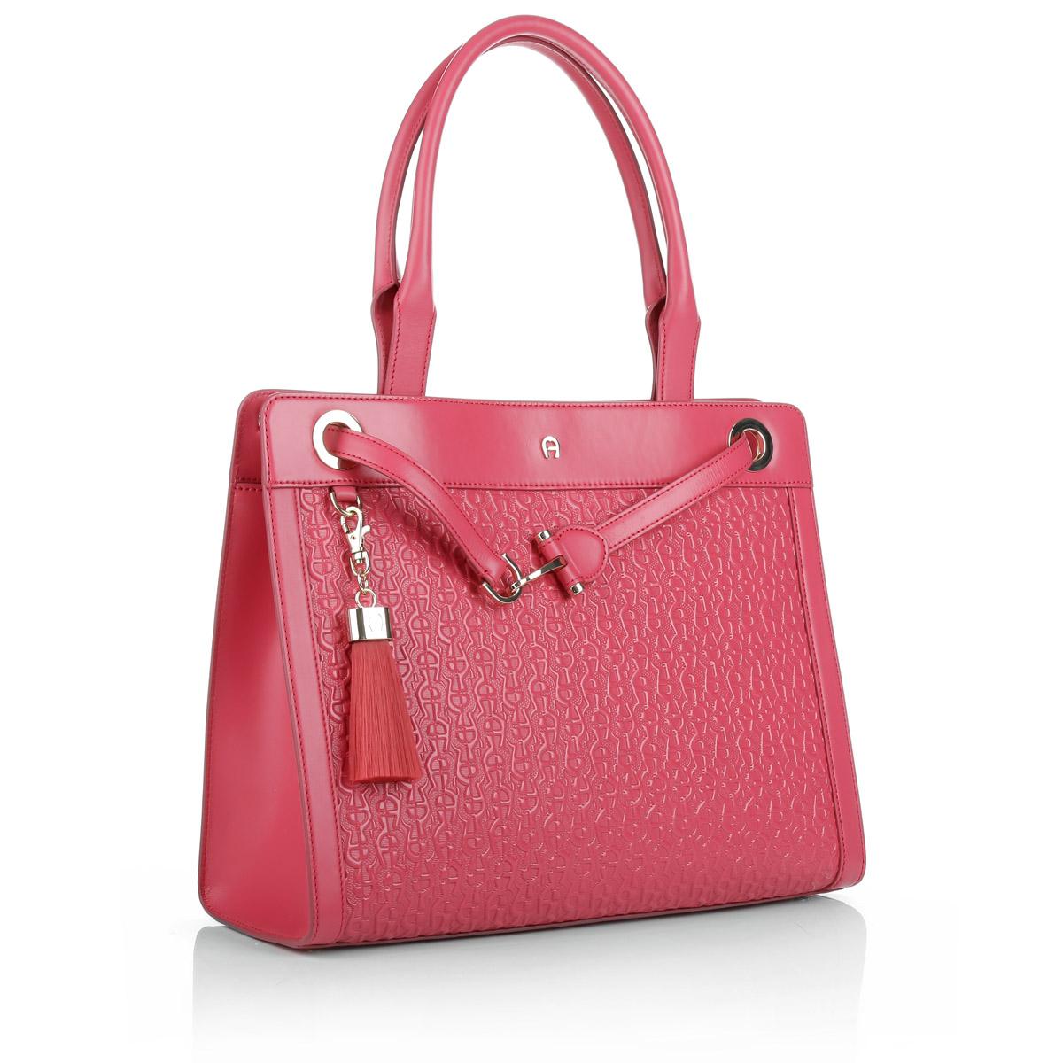 Stunning top handle hand bag & wallet set by Aigner
Consisting of a handbag with shoulder strap, charms and a matching zip wallet

Top handle bag with shoulder strap
Made of finest pink leather with embossed logo emblem front and back
   Two