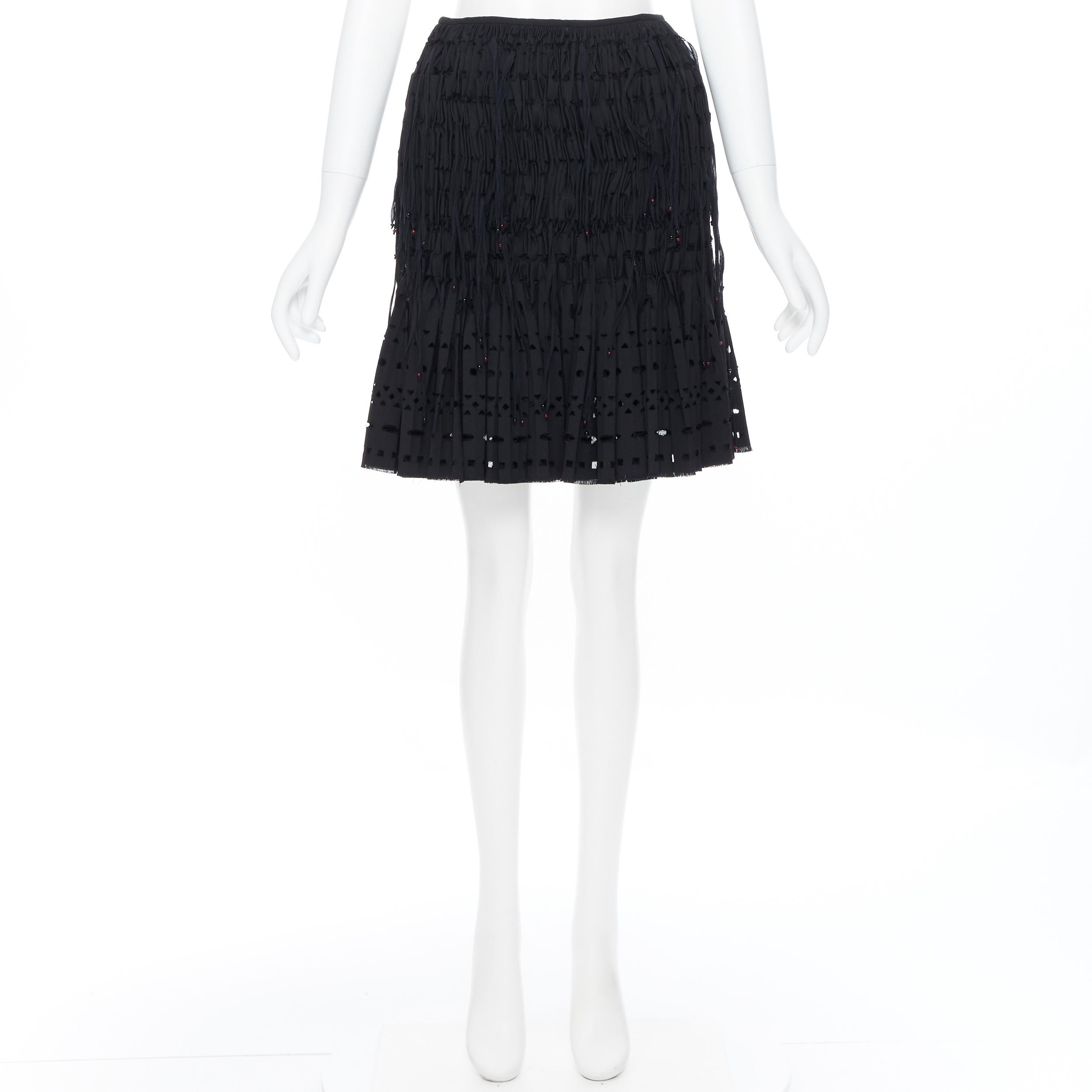 Black new ALAIA black geometric cut out pleated shirred red bead fringe skirt FR38 For Sale