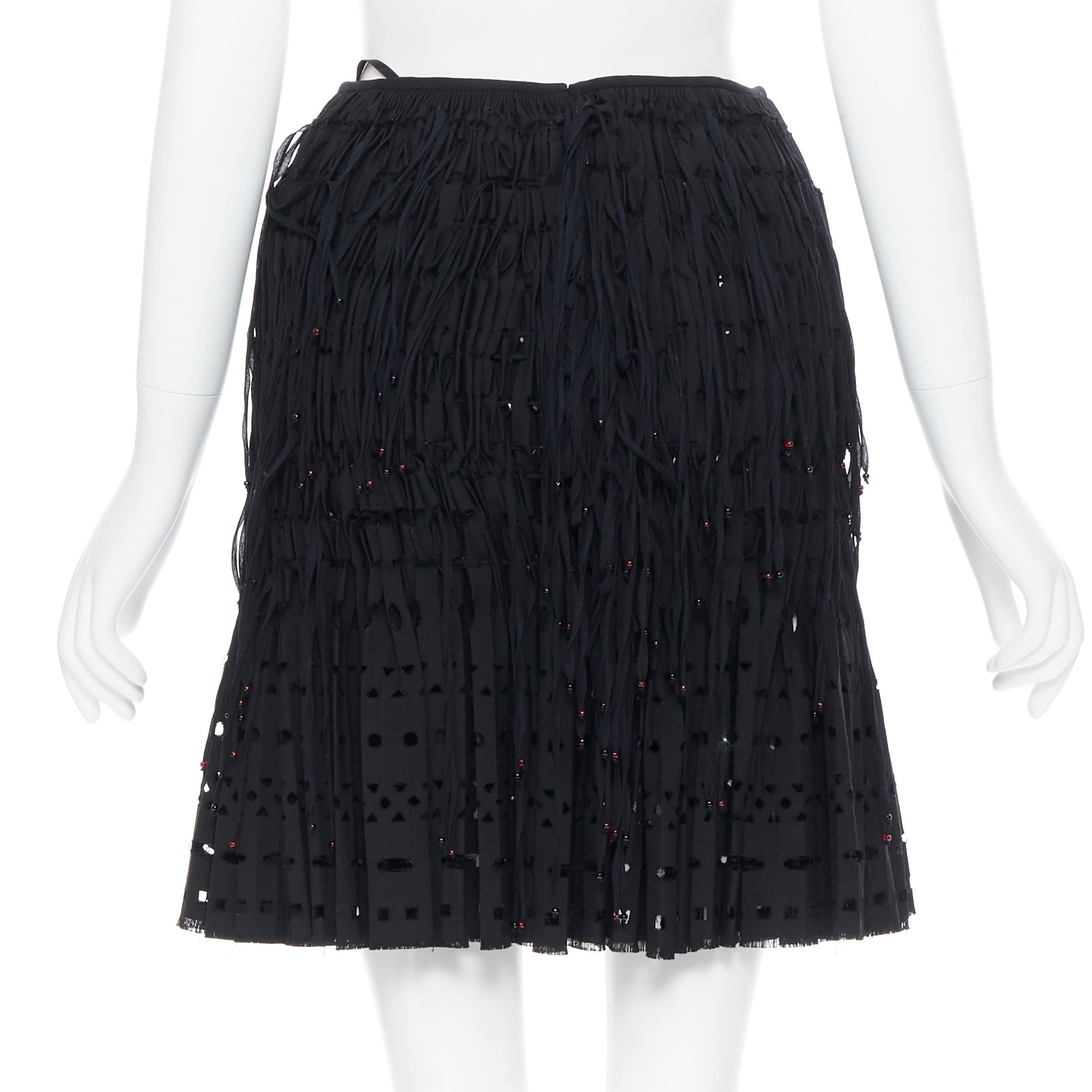 new ALAIA black geometric cut out pleated shirred red bead fringe skirt FR38 For Sale 1