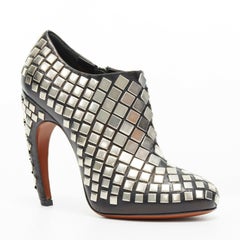 new ALAIA black leather silver square stud embellished curved heel bootie EU38