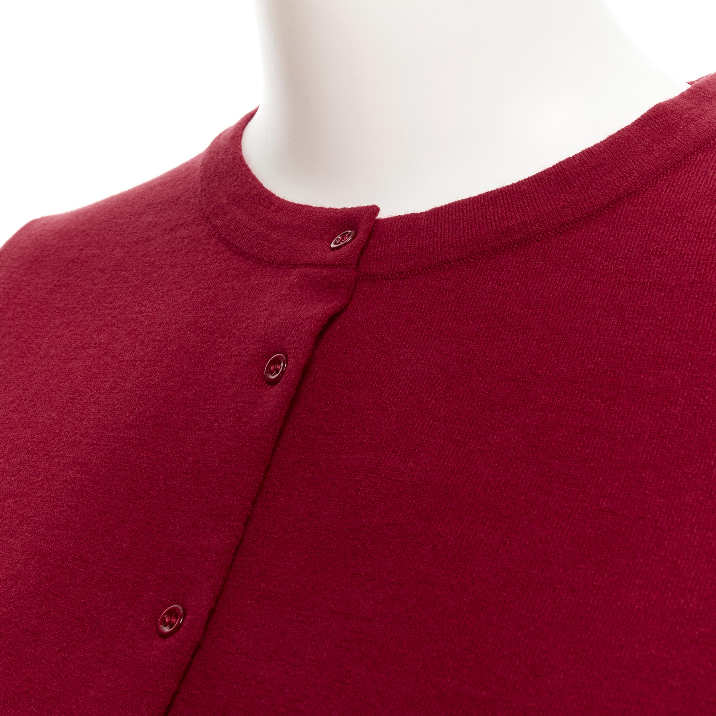 new ALAIA Signature cropped stretch knit button cardigan Garance red FR36 XS 
Reference: TGAS/B01946 
Brand: Alaia 
Designer: Azzedine Alaia 
Collection: Permanent 
Material: Wool 
Color: Red 
Pattern: Solid 
Closure: Button 
Extra Detail: An Alaia