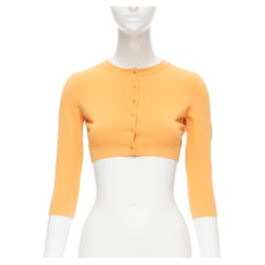 Cardigan court en tricot extensible orange ALAIA Signature avec boutons FR38 S, neuf