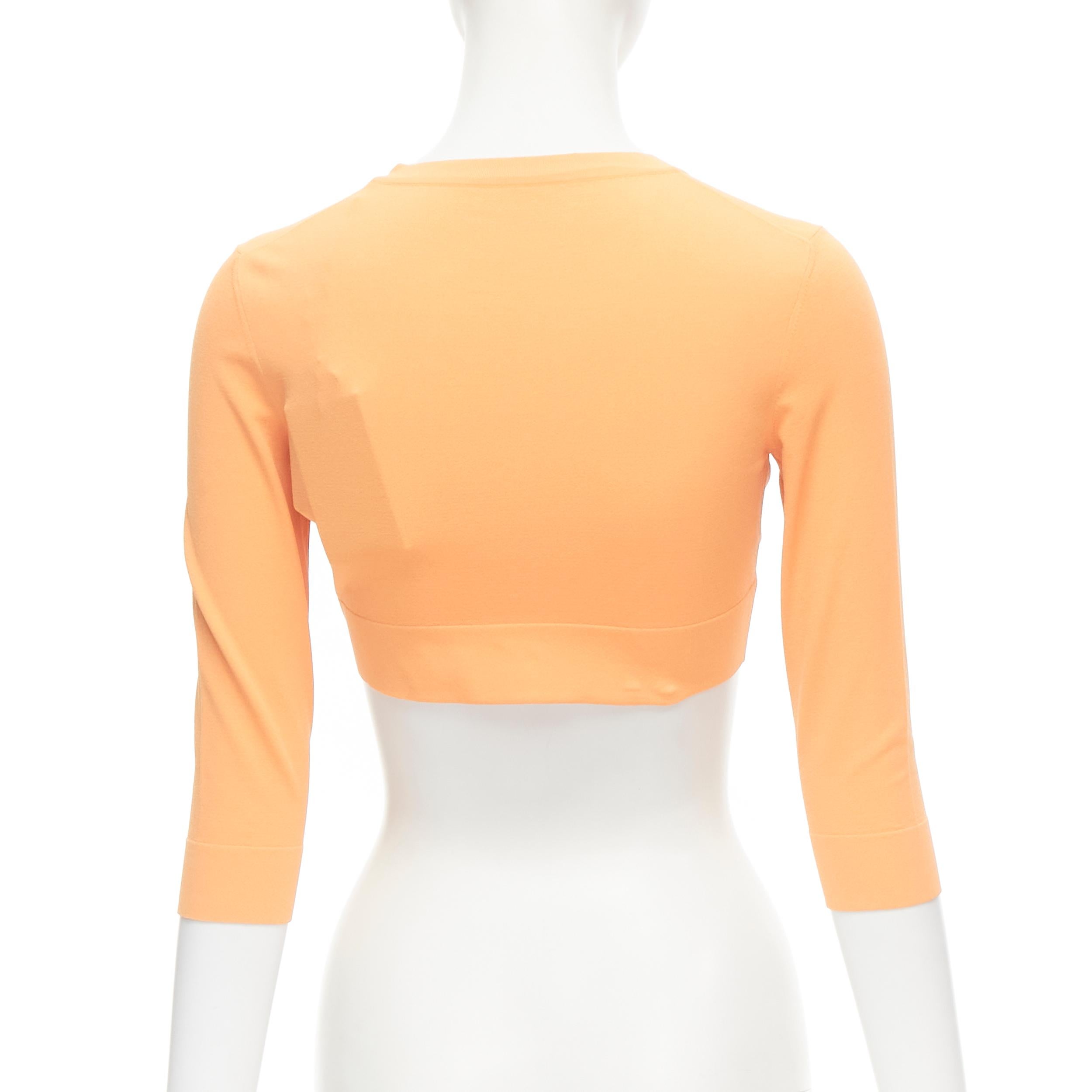 Women's new ALAIA Signature cropped stretch knit button cardigan Peche orange FR38 S For Sale