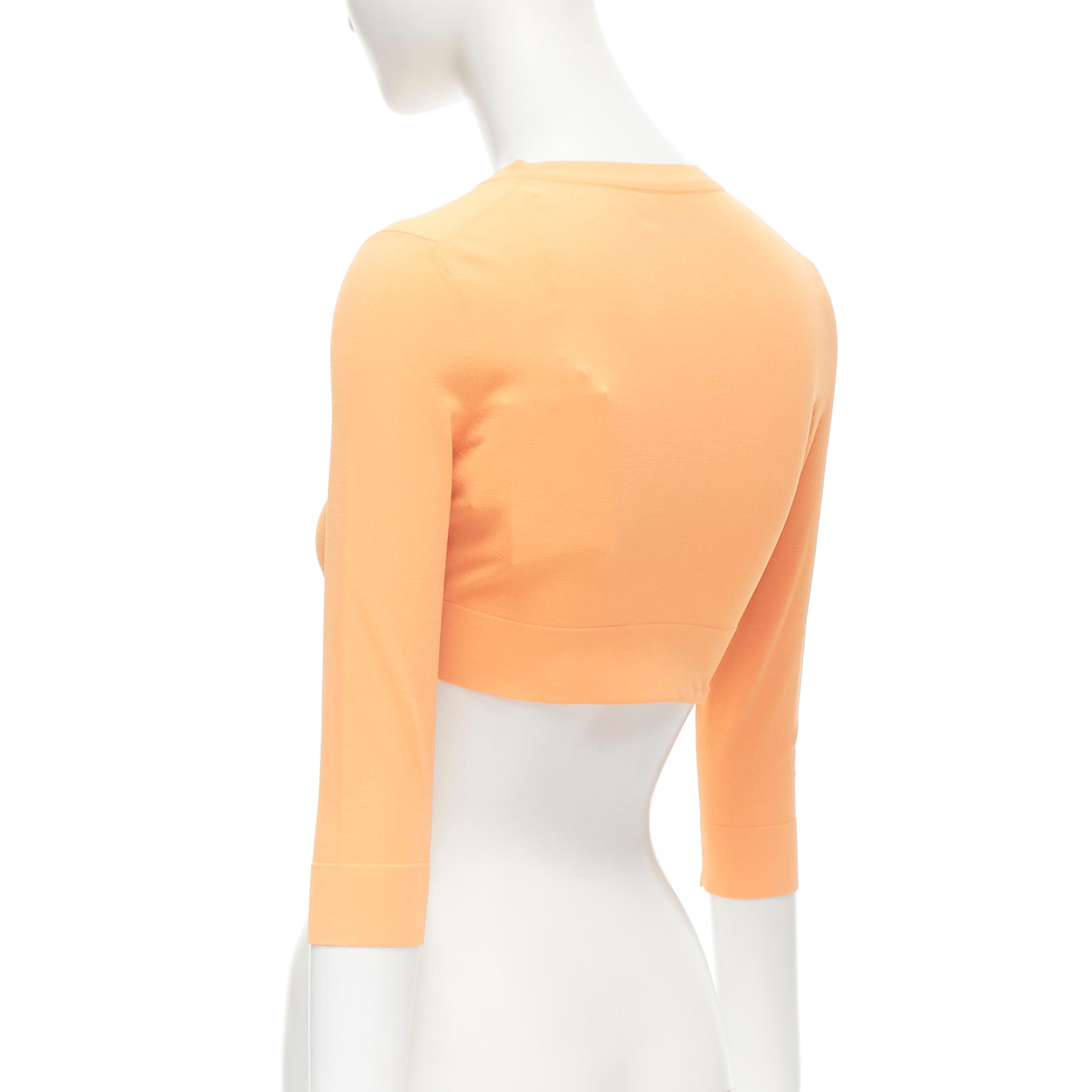 new ALAIA Signature cropped stretch knit button cardigan Peche orange FR38 S For Sale 1