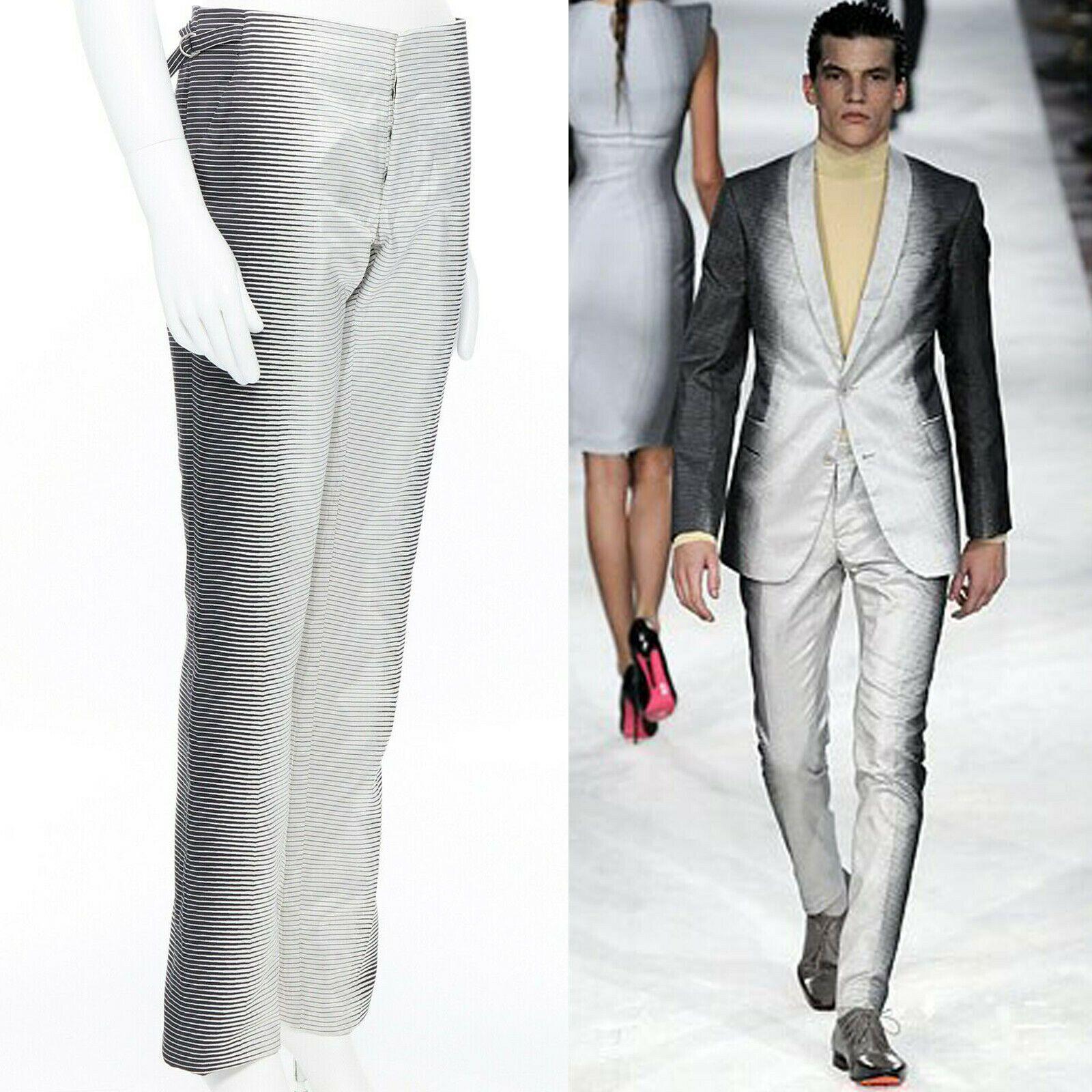 new ALEXANDER MCQUEEN 2009 grey ombre striped slim leg pant IT44 XS

ALEXANDER MCQUEEN
FROM THE RESORT 2009 COLLECTION
New with tags . Pearl grey and black . Geometric stripes . Ombre gradient effect . Loop tab details on side of waistband . Side