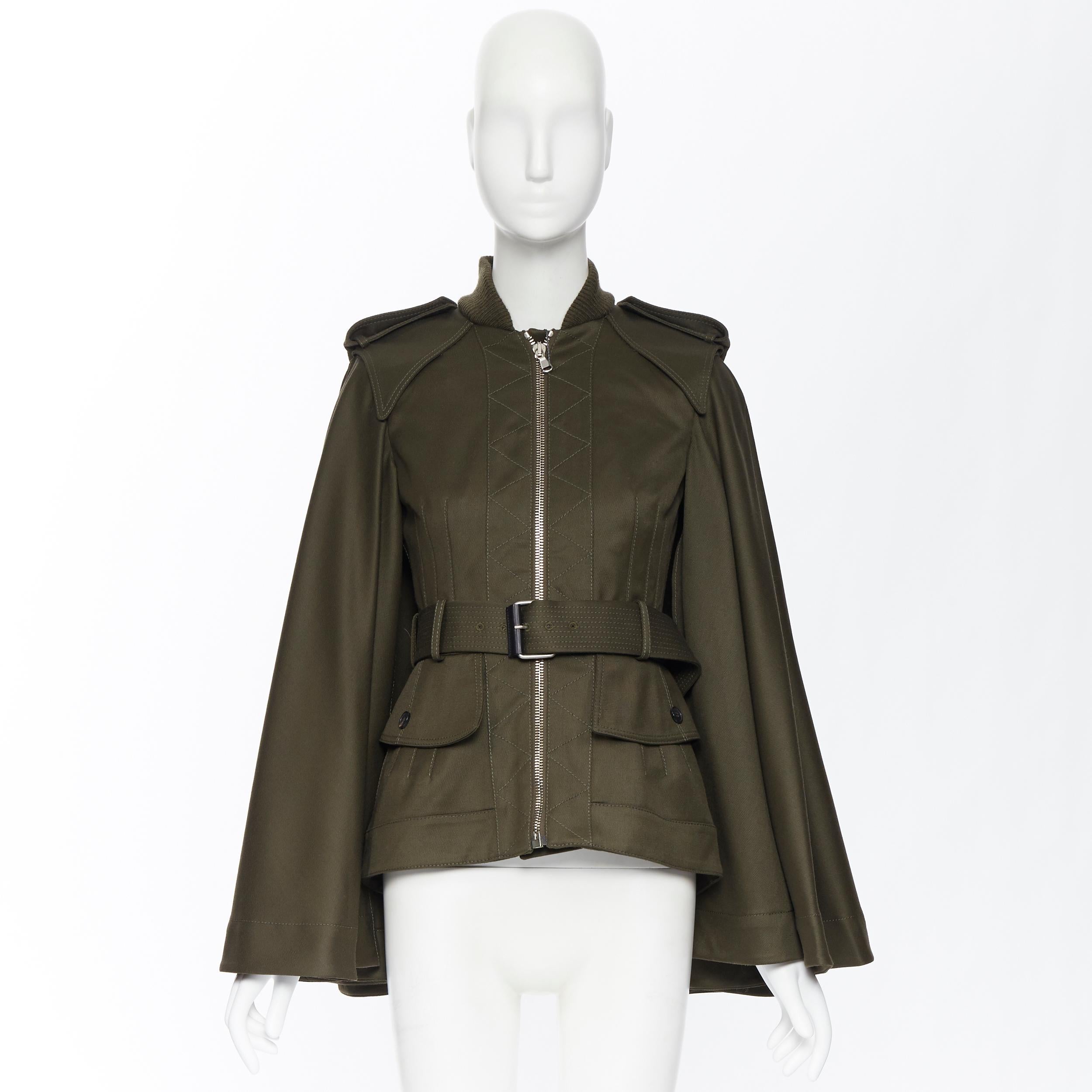 new ALEXANDER MCQUEEN 2015 khaki green belted military cape jacket IT36 XS
Reference: TGAS/A05052
Brand: Alexander McQueen
Designer: Sarah Burton
Collection: 2015 
Material: Cotton
Color: Green
Pattern: Solid
Closure: Zip
Extra Detail: Removable