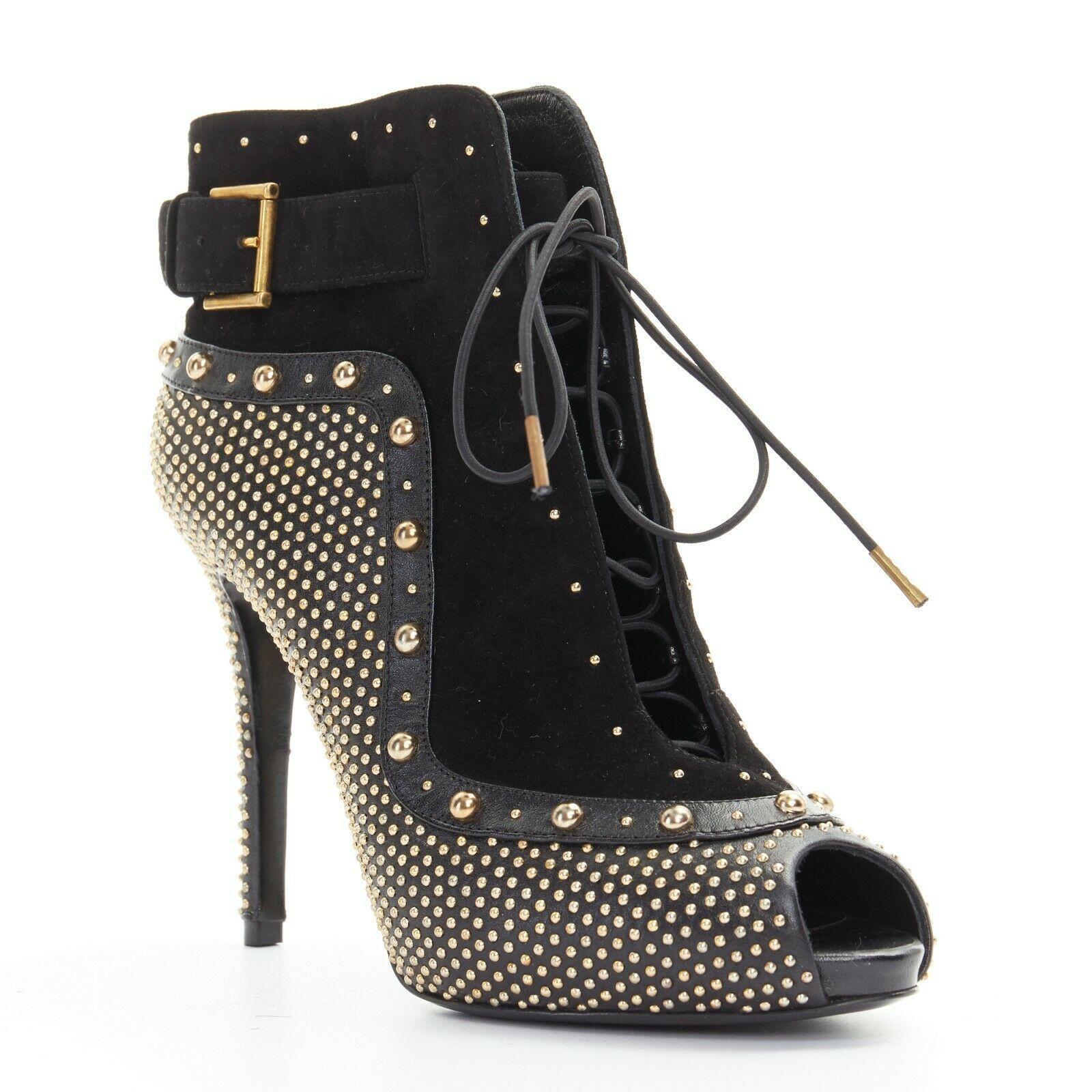 new ALEXANDER MCQUEEN black suede gold stud peep toe lace up ankle bootie EU37
ALEXANDER MCQUEEN
Black leather and suede upper. 
Gold-tone micro-stud embellishment. Peep toe. 
Larger stud trimming along edges. Peep toe. 
Concealed platform sole.