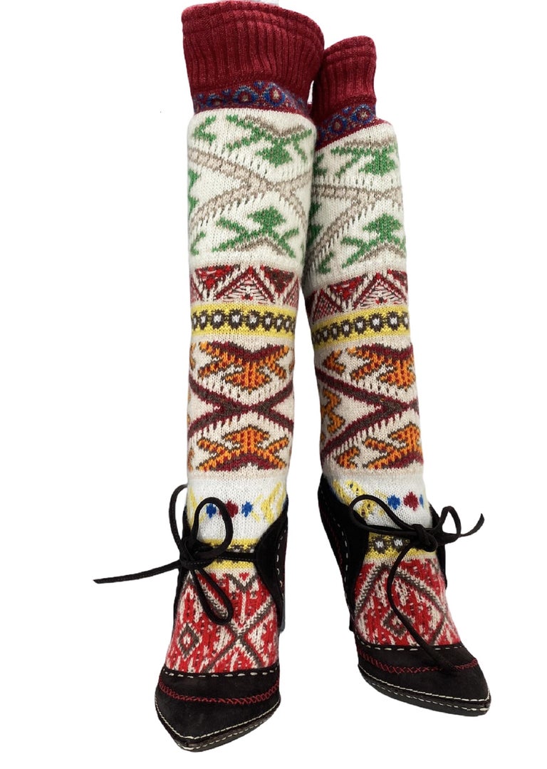 New Uber Rare Alexander McQueen Knitted Boots
F/W 2005 Runway Collection.
Designer Size 39 - US 9
Inspired by Norwegian Ethnic Design, Soft Knitted Shaft, Hand Stitched Chocolate Suede with Elegant Bow.
Total length - 19.5 inches, Heel Height -