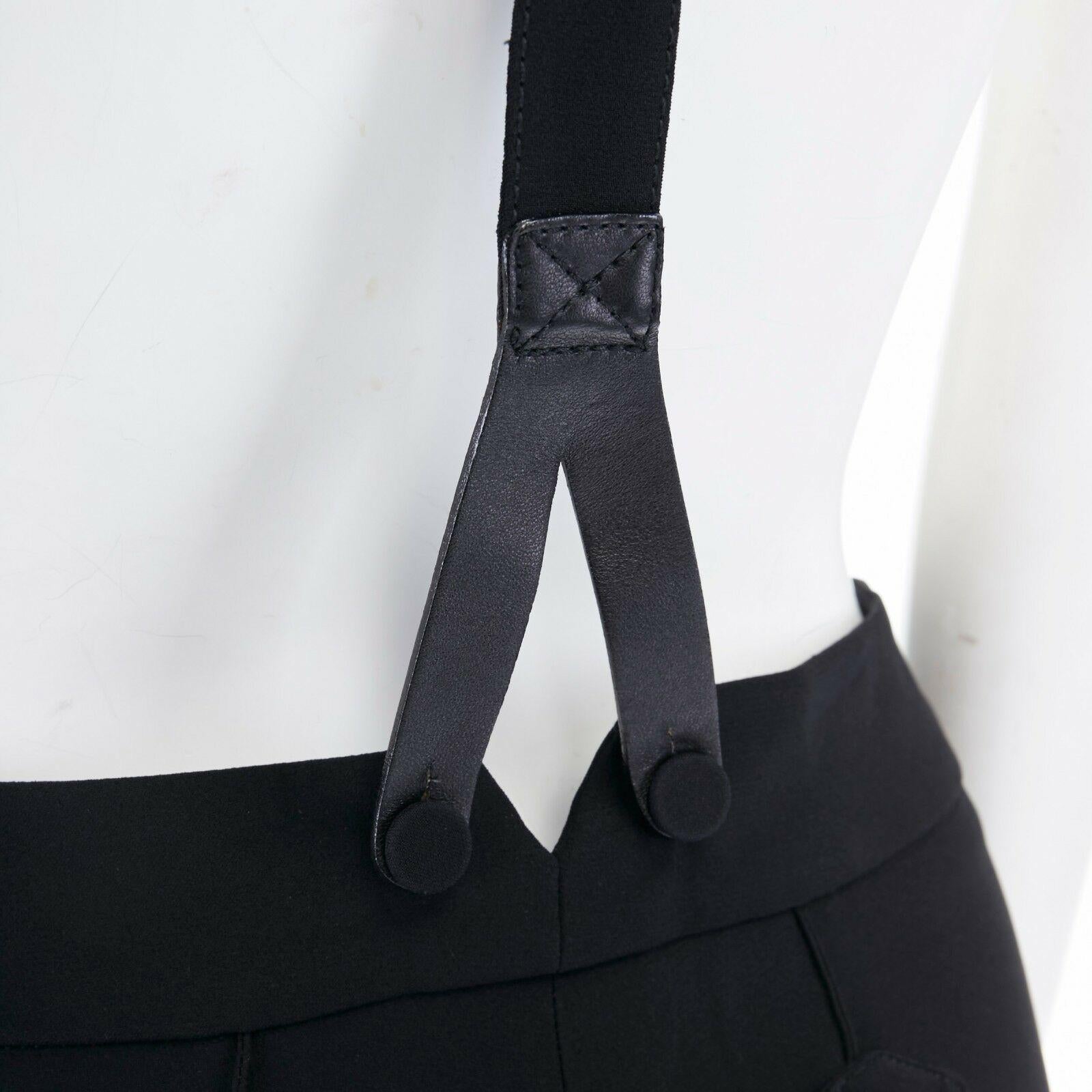 new ALEXANDER MCQUEEN Runway SS07 suspender braces cropped dungaree pants IT40
ALEXANDER MCQUEEN
FROM THE SPRING SUMMER 2007 COLLECTION
Acetate, viscose. Detachable suspender braces with leather tabs. 
Adjustable silver hardware buckle. Fabric