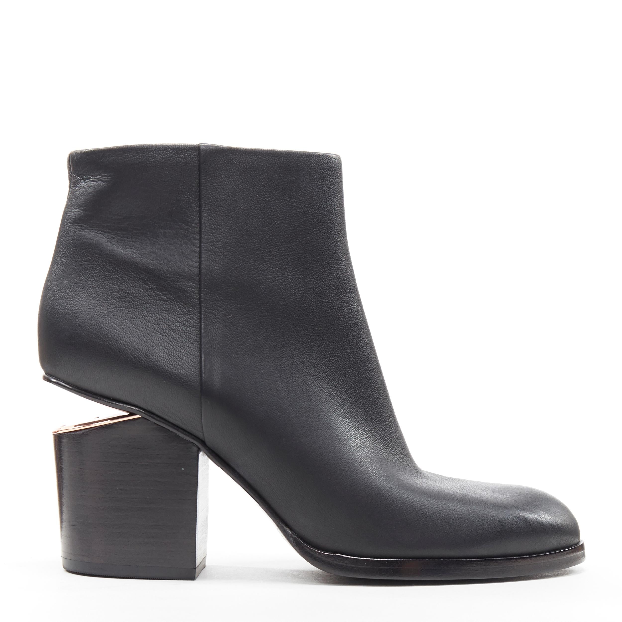 new ALEXANDER WANG Gabi black leather copper plated cut out ankle bootie EU40
Brand: Alexander Wang
Designer: Alexander Wang
Model Name / Style: Gabi
Material: Leather
Color: Black
Pattern: Solid
Closure: Zip
Extra Detail: Cut out heel. Copper-tone