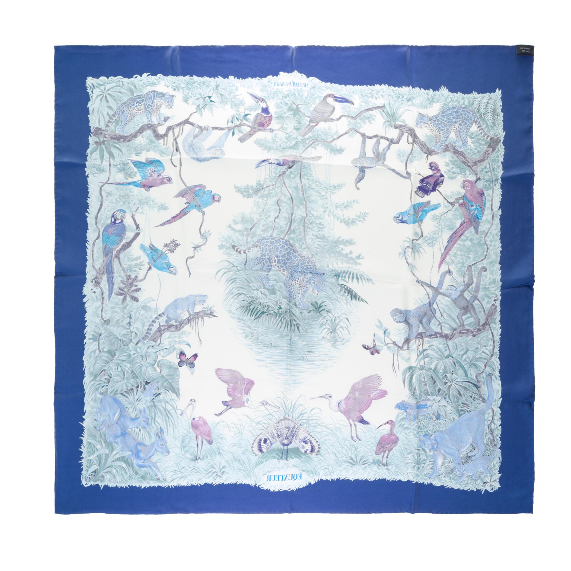 Beautiful Hermès square with animal designs signed Robert DALLET in twill wash on blue, white and green background.
Signature: 