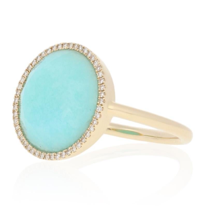 This ring is a size 7 1/2.

Metal Content: Guaranteed 14k Gold as stamped

Stone Information: 
Genuine Amazonite
Cut: Round

Natural Diamonds  
Clarity: VS2
Color: G  
Cut: Single
Total Carats: 0.11ctw

Style: Solitaire with Accents / Halo
Face