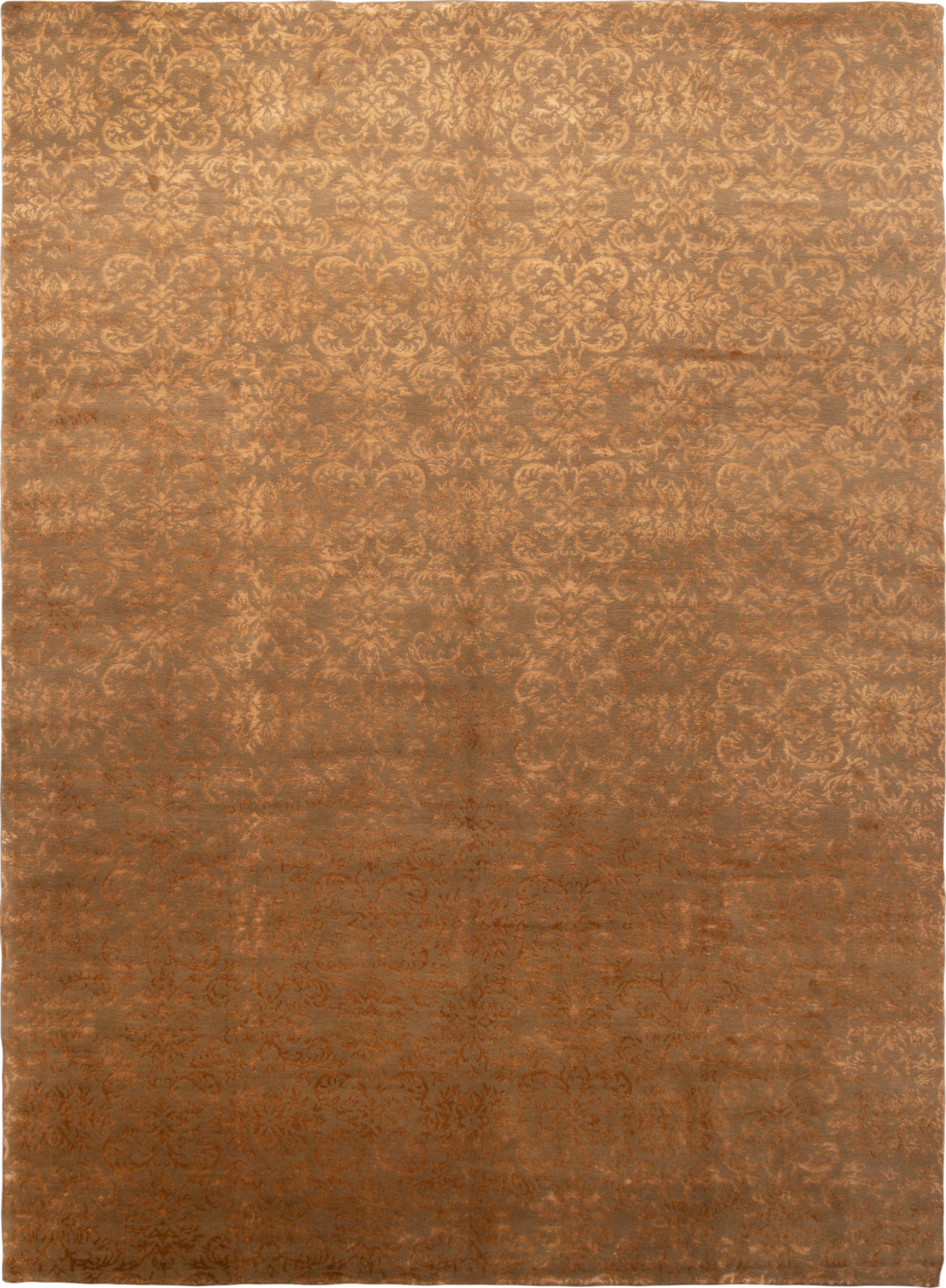 Originating from Nepal, this new Arabesque rug features a lustrous, fine weave of wool and silk complementing the all over field design. Hand knotted, the dominant, brass gold colourway is emphasized through the silk’s natural luster, giving a regal