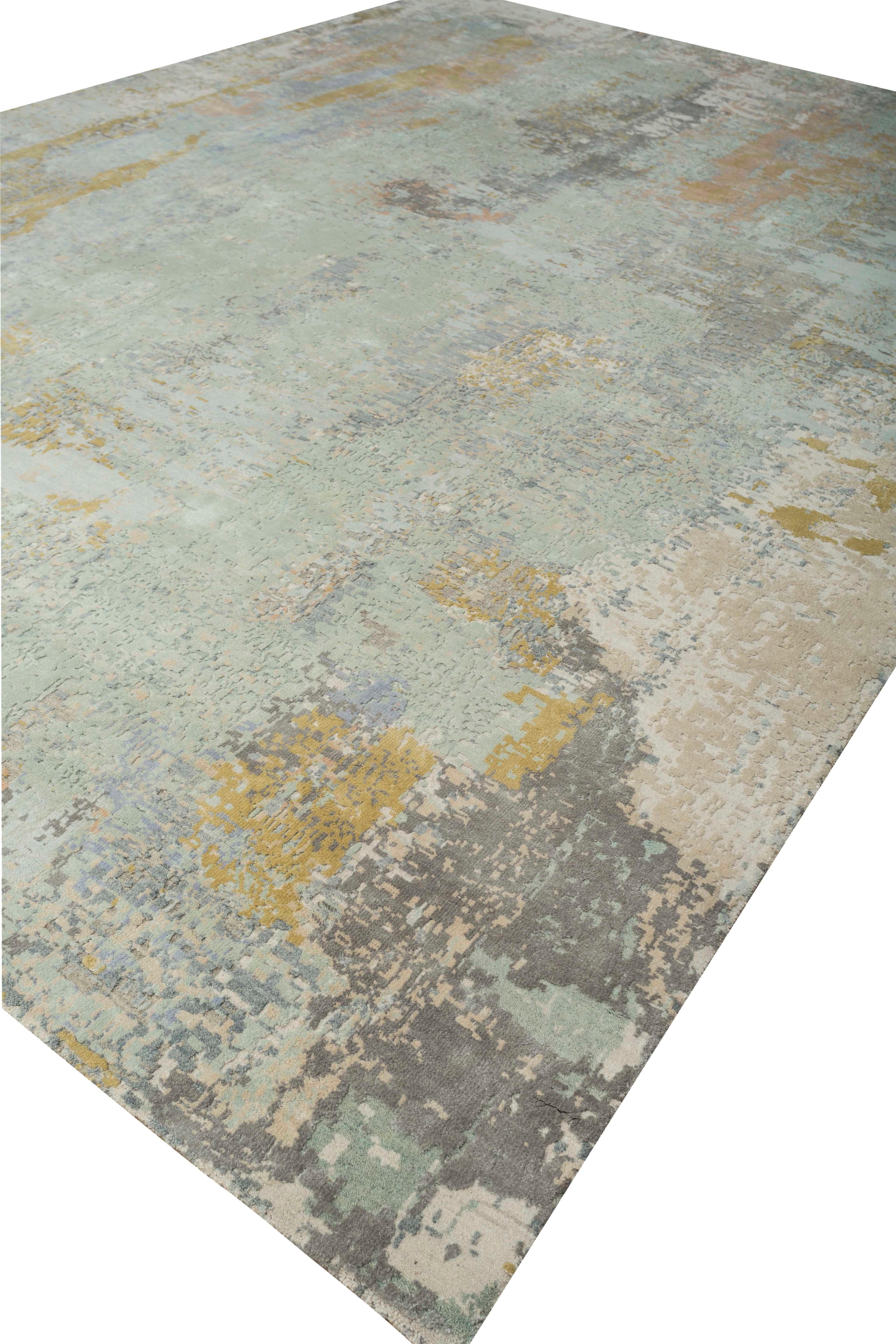 New area rug handwoven from the finest sheep’s wool and real silk. It’s colored with all-natural vegetable dyes that are safe for humans and pets. It features beautiful modern watercolor art design patterns that blend perfectly with contemporary