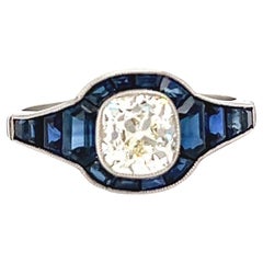 Art Deco Inspired 0.98 Carat Old Mine Cut Diamond Sapphire Platinum Ring