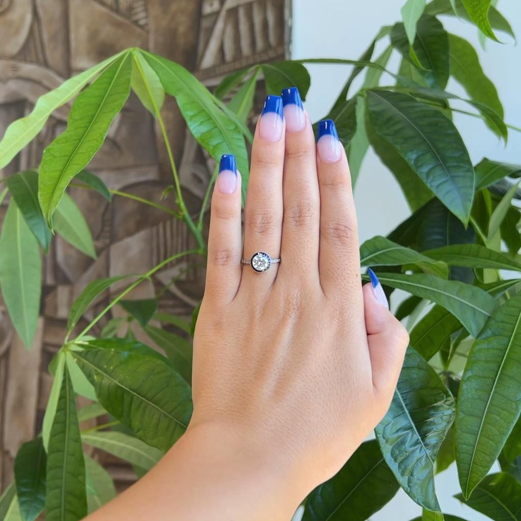 Round Cut Art Deco Inspired 0.87 Carat Diamond Sapphire Platinum Halo Engagement Ring For Sale