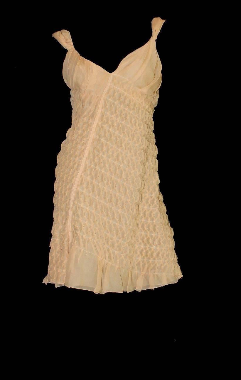  Stunning PRADA dress
Just like couture - hand-sewn by the seamstresses in Prada's atelier of the finest chiffon silk existing
Asymmetric cut
3D ruched honeycomb details for a great look
  Closes with invisible snap fasteners
   Frayed details
 