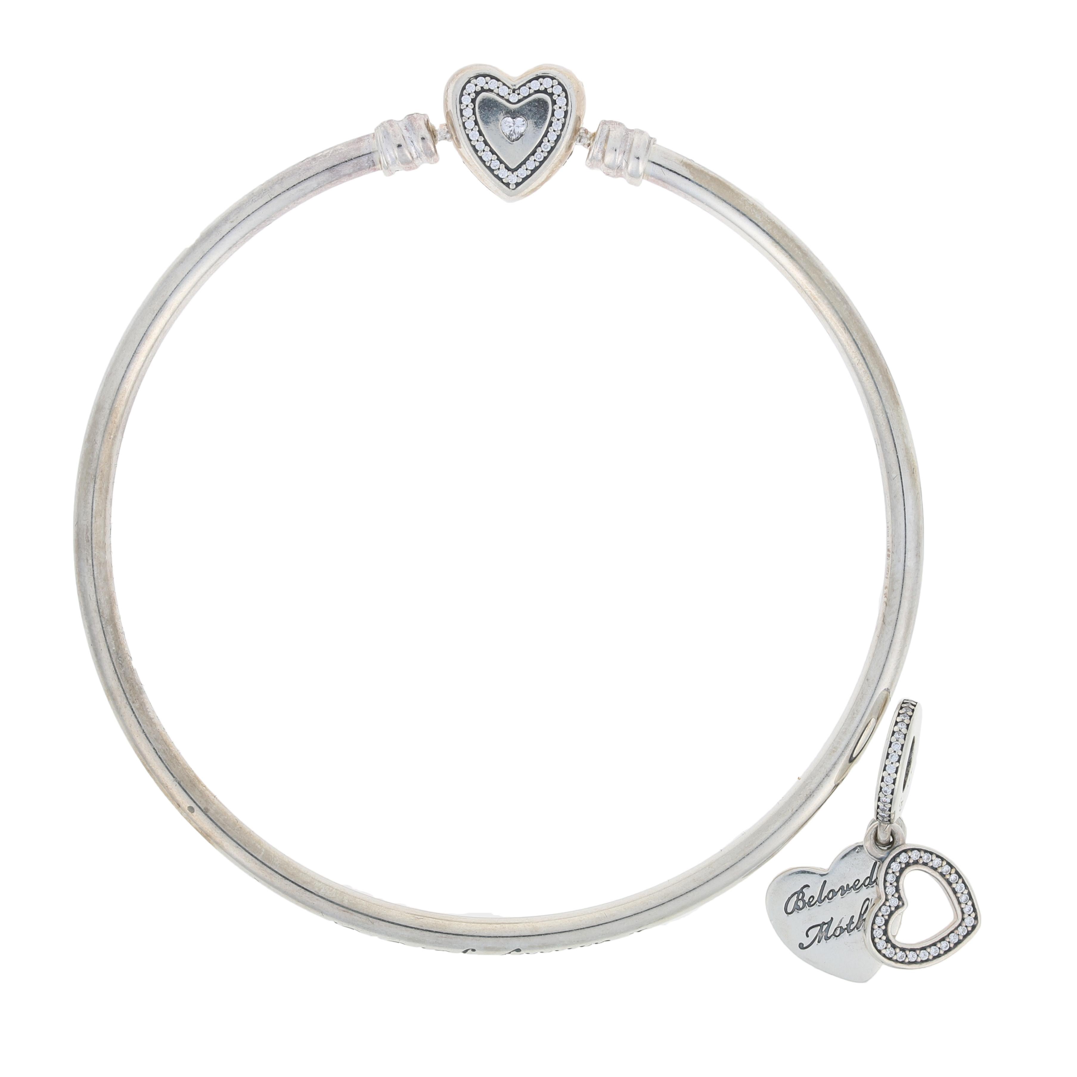 This NEW piece is guaranteed 100% authentic PANDORA, as we recently bought out an authorized PANDORA retailer.

Brand: Pandora
Number: USB7961-17
Title: A Mother's Love Gift Set  

Metal Content: Sterling Silver

Stone Info: Clear Cubic