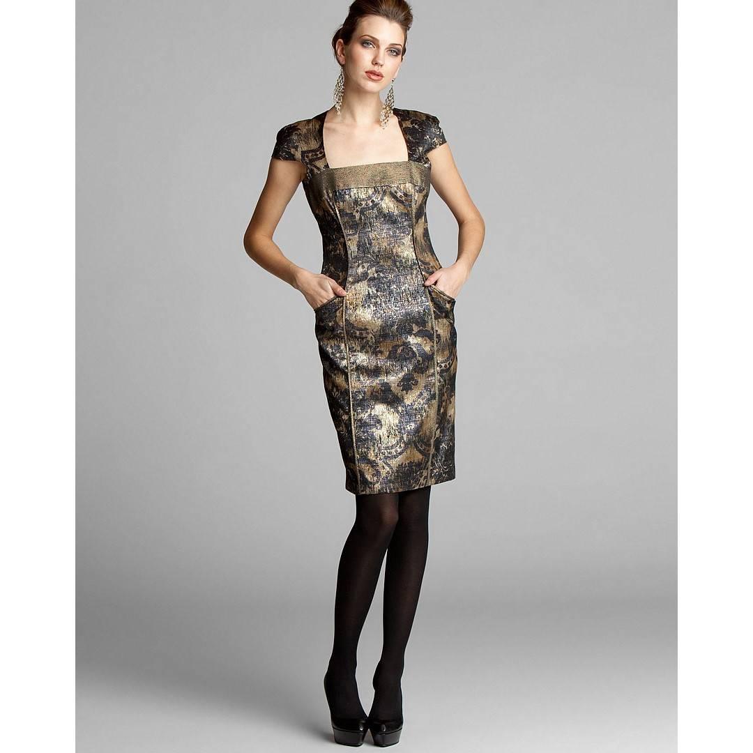 Badgley Mischka Dress
Brand New with Tags

* Size: 2
* Two Side Pockets
* Metallic Gold & Black Flower Print
* Cap Sleeves & Square Neck
* Fully Lined
* Center Back Zipper & One Button Closure
* 79% Polyester  
  21% Cotton 
