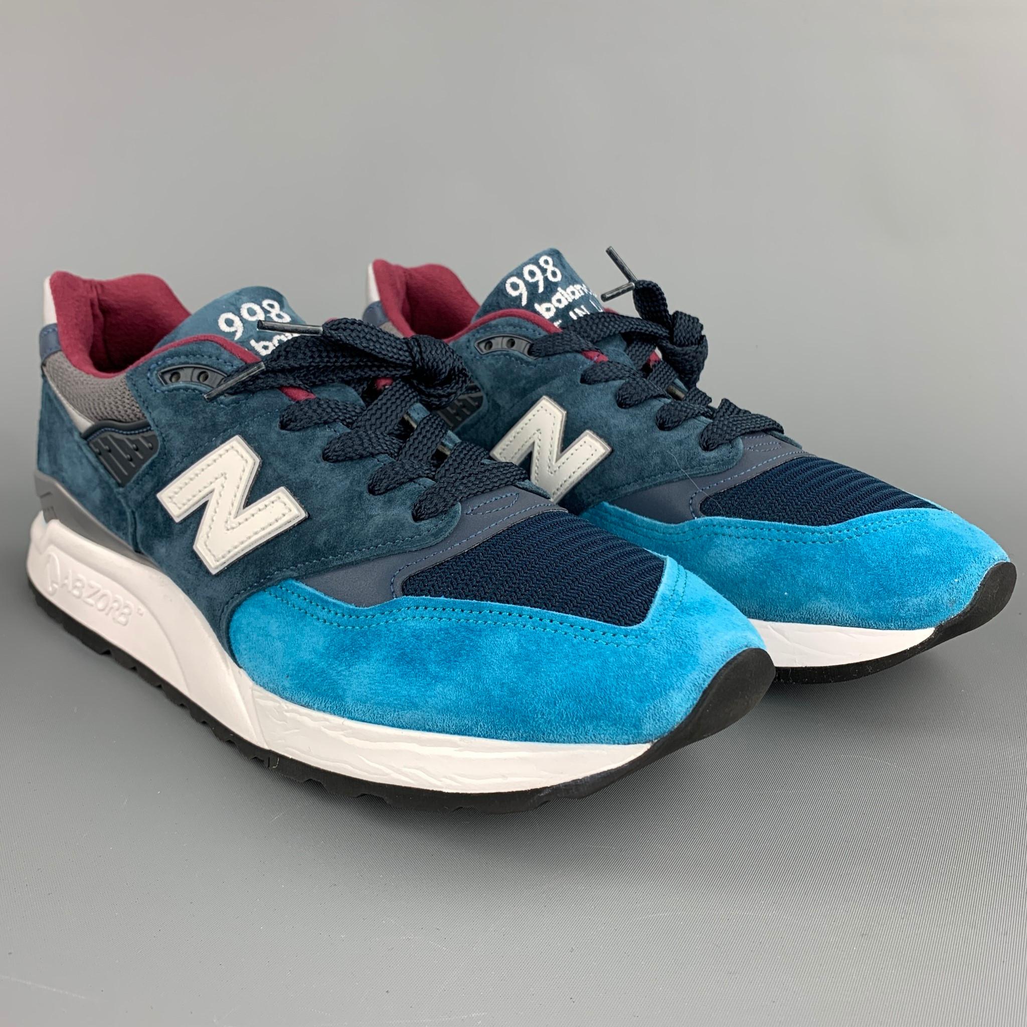 NEW BALANCE 998 sneakers comes in a blue suede with a color block design featuring a rubber 