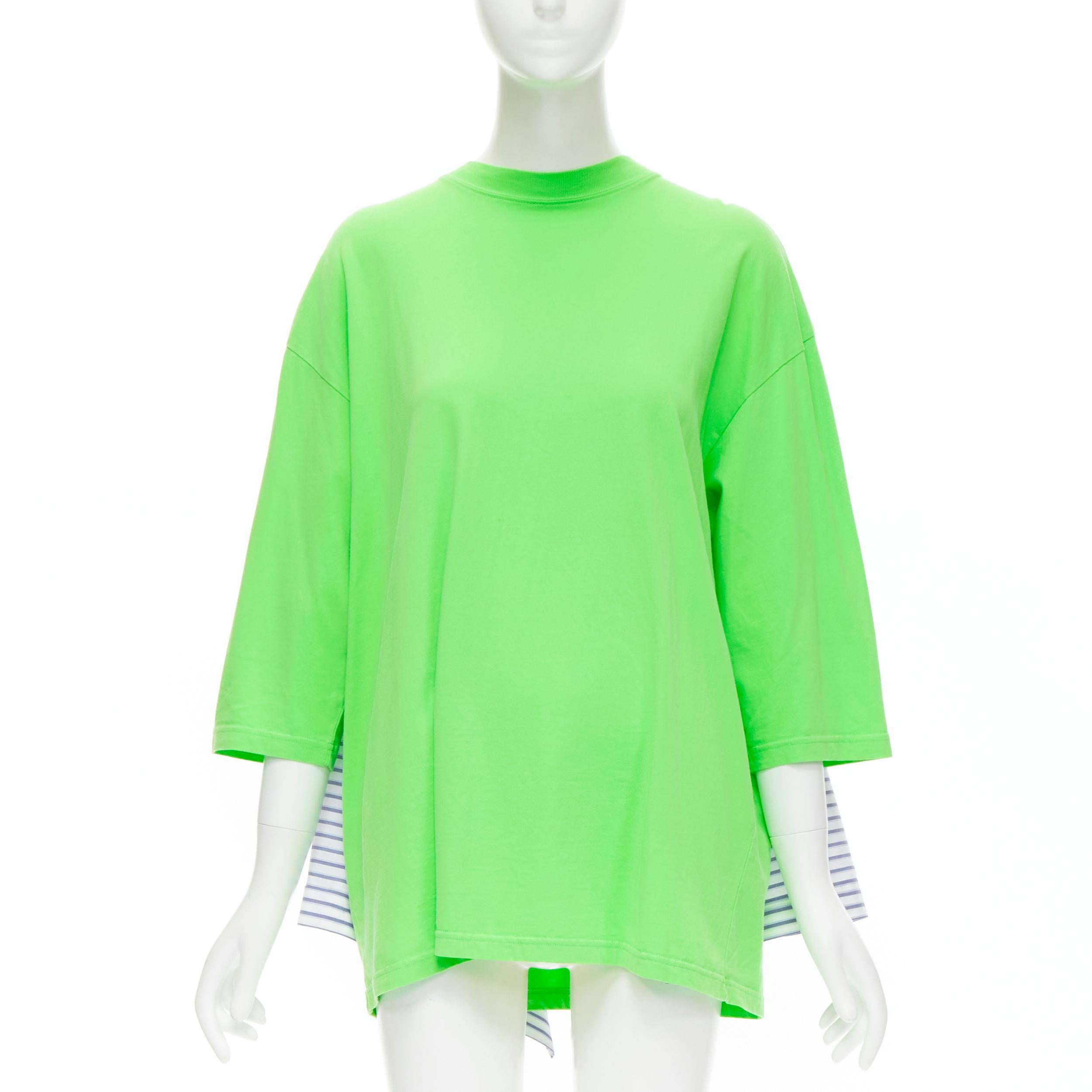 new BALENCIAGA 2017 green tshirt blue striped shirt 2 way draped top FR34 XS 
Reference: MELK/A00121 
Brand: Balenciaga 
Designer: Demna 
Collection: 2017 
Material: Cotton 
Color: Green 
Pattern: Striped 
Extra Detail: The shirt can be worn 2 ways.