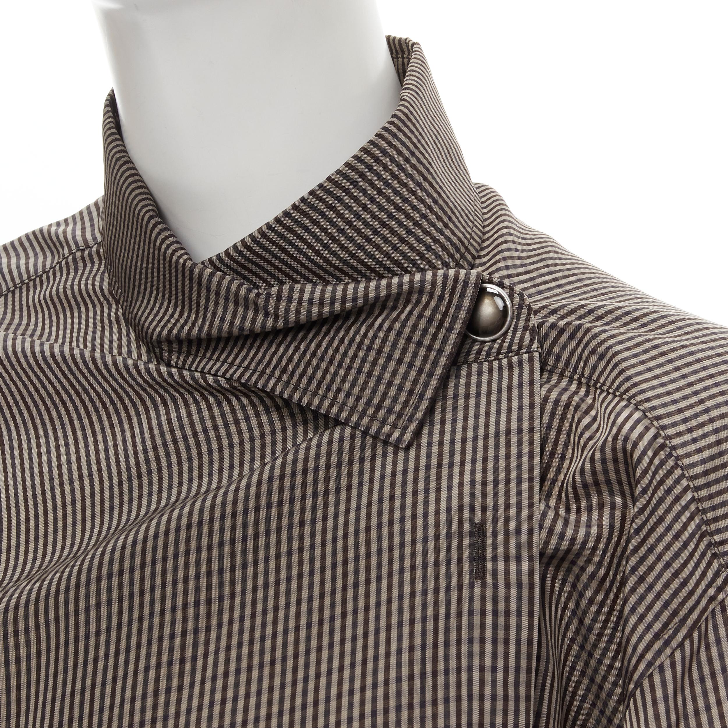new BALENCIAGA 2018 Pulled collar Prince of Wales checked shirt FR34 XS 
Reference: MELK/A00124 
Brand: Balenciaga 
Designer: Demna 
Collection: 2018 
Material: Cupro 
Color: Brown 
Pattern: Check 
Closure: Button Extra Detail: Pulled collar design.